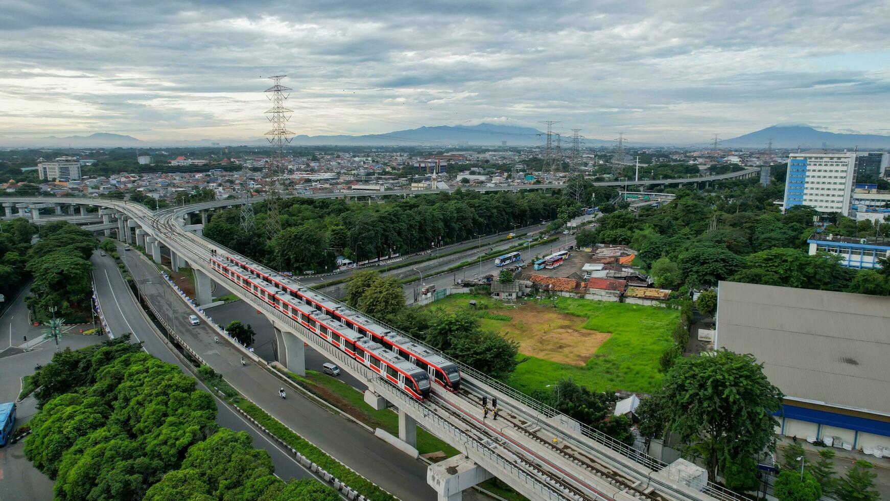 Aerial view of Jakarta LRT train trial run for phase 1 from UKI Cawang. Jakarta, Indonesia, March 8, 2022 photo