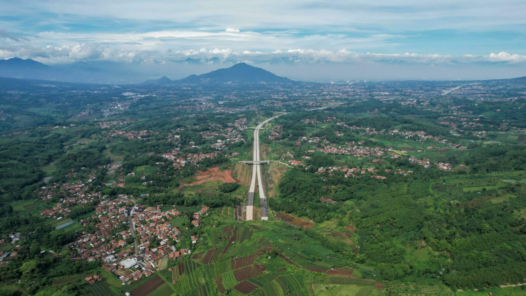 Aerial view of Cisumdawu Twin Tunnel Bandung City, Toll Gate and the Intersection which is the Beginning of the Cisumdawu Toll Road Section 1. Bandung, Indonesia, May 19, 2022 photo