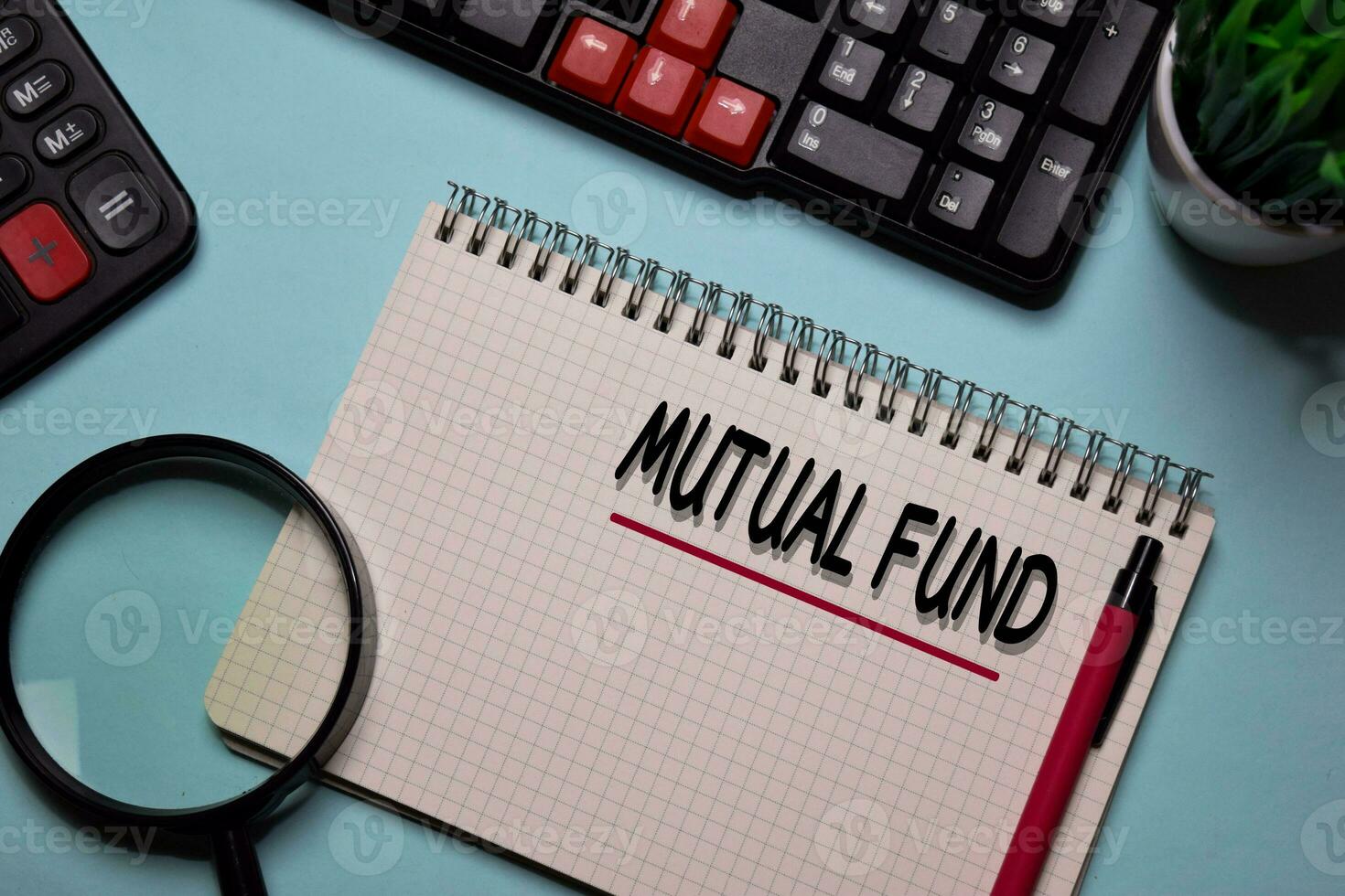 Mutual Fund write on a book isolated on office desk. photo