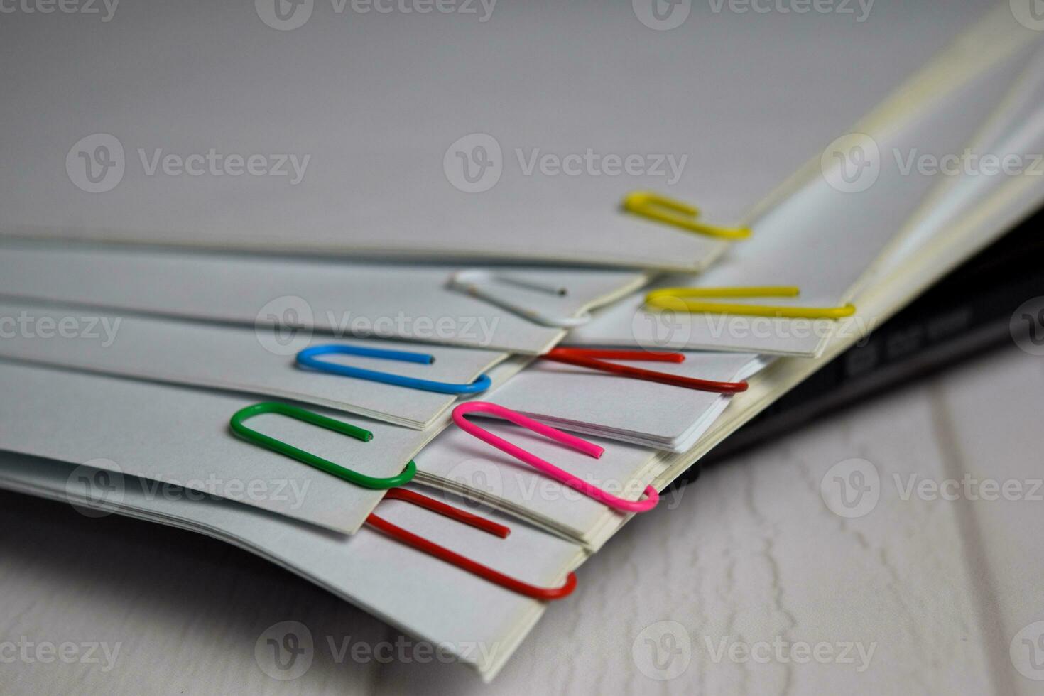 File folder and Stack of business report paper file isolated on office desk. File document concept photo
