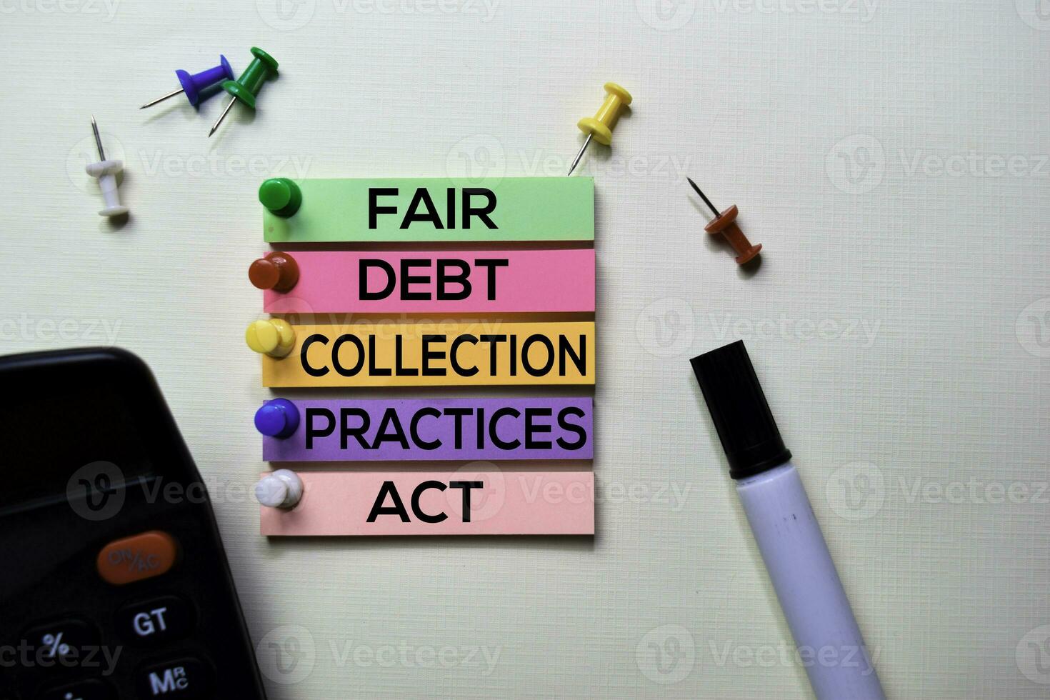 Fair Debt Collection Practices Act - FDCPA text on sticky notes isolated on office desk photo