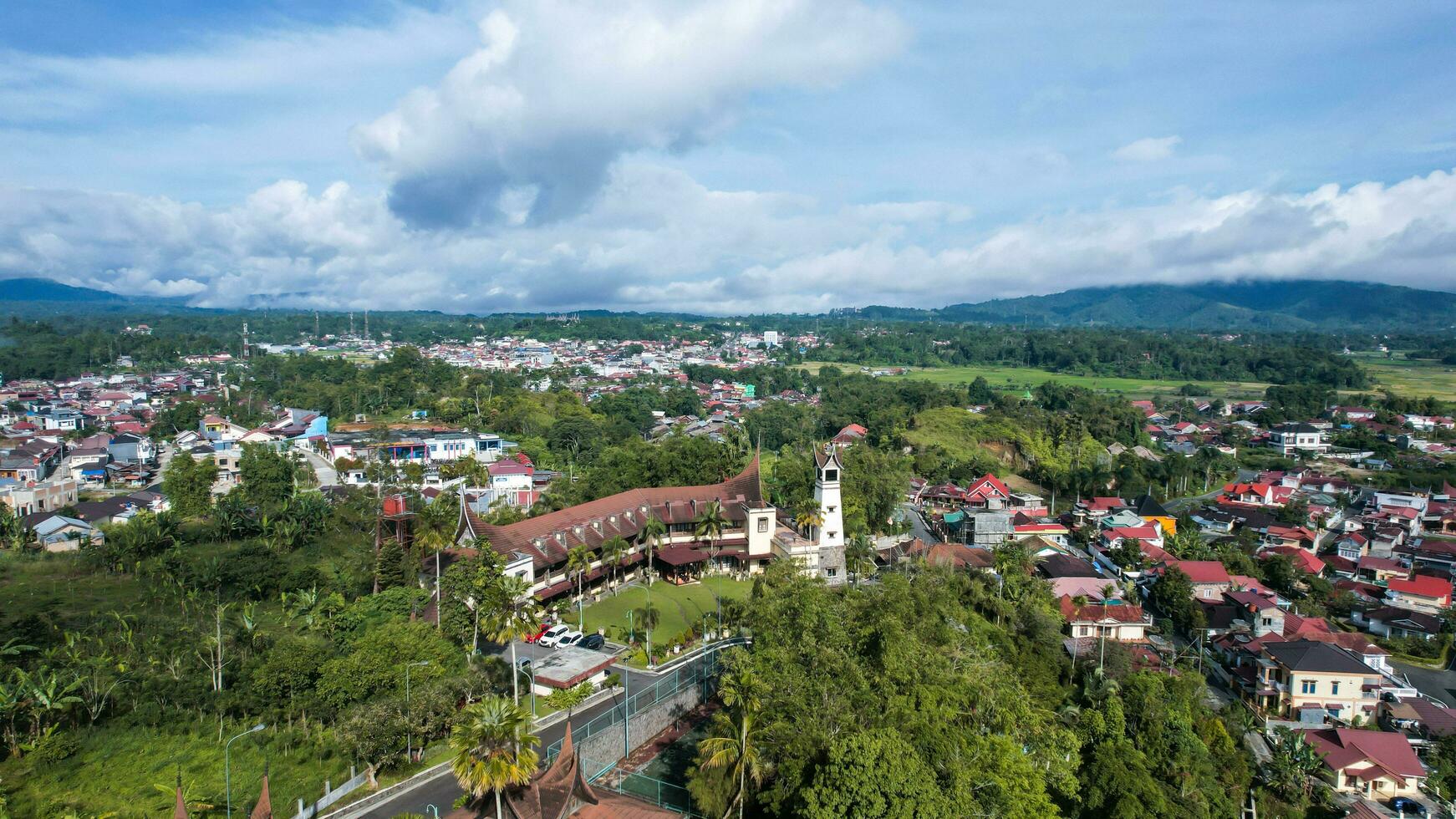 Aerial view of Traditional Minangkabau houses located in Bukittinggi, West Sumatra, Indonesia. Bukittinggi, Indonesia - January 25, 2023 photo