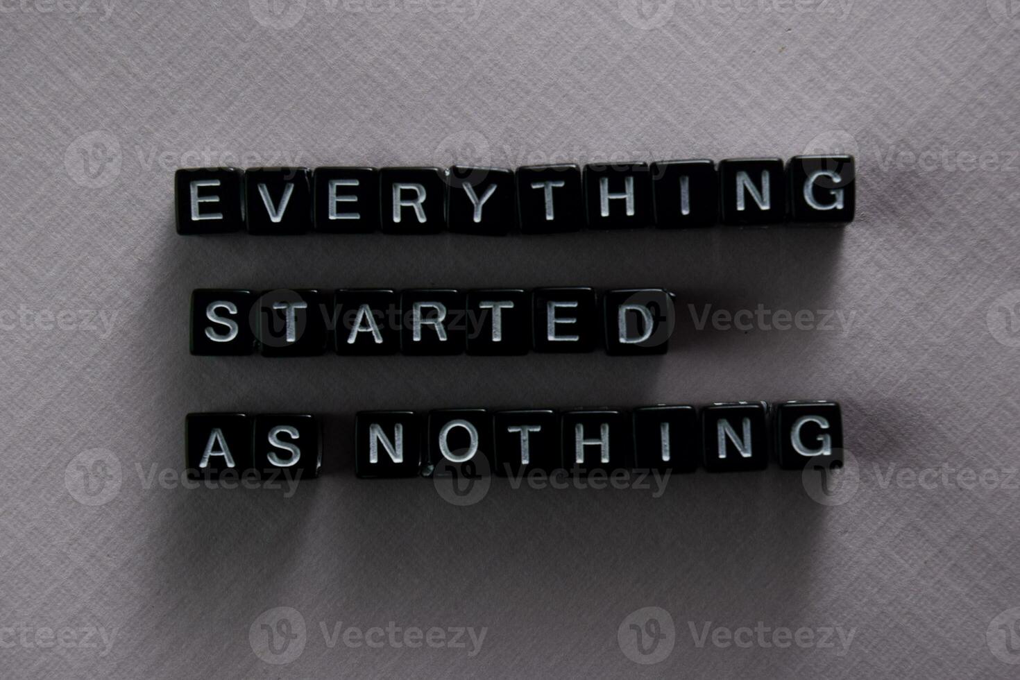 Everything started as nothing on wooden blocks. Motivation and inspiration concept photo