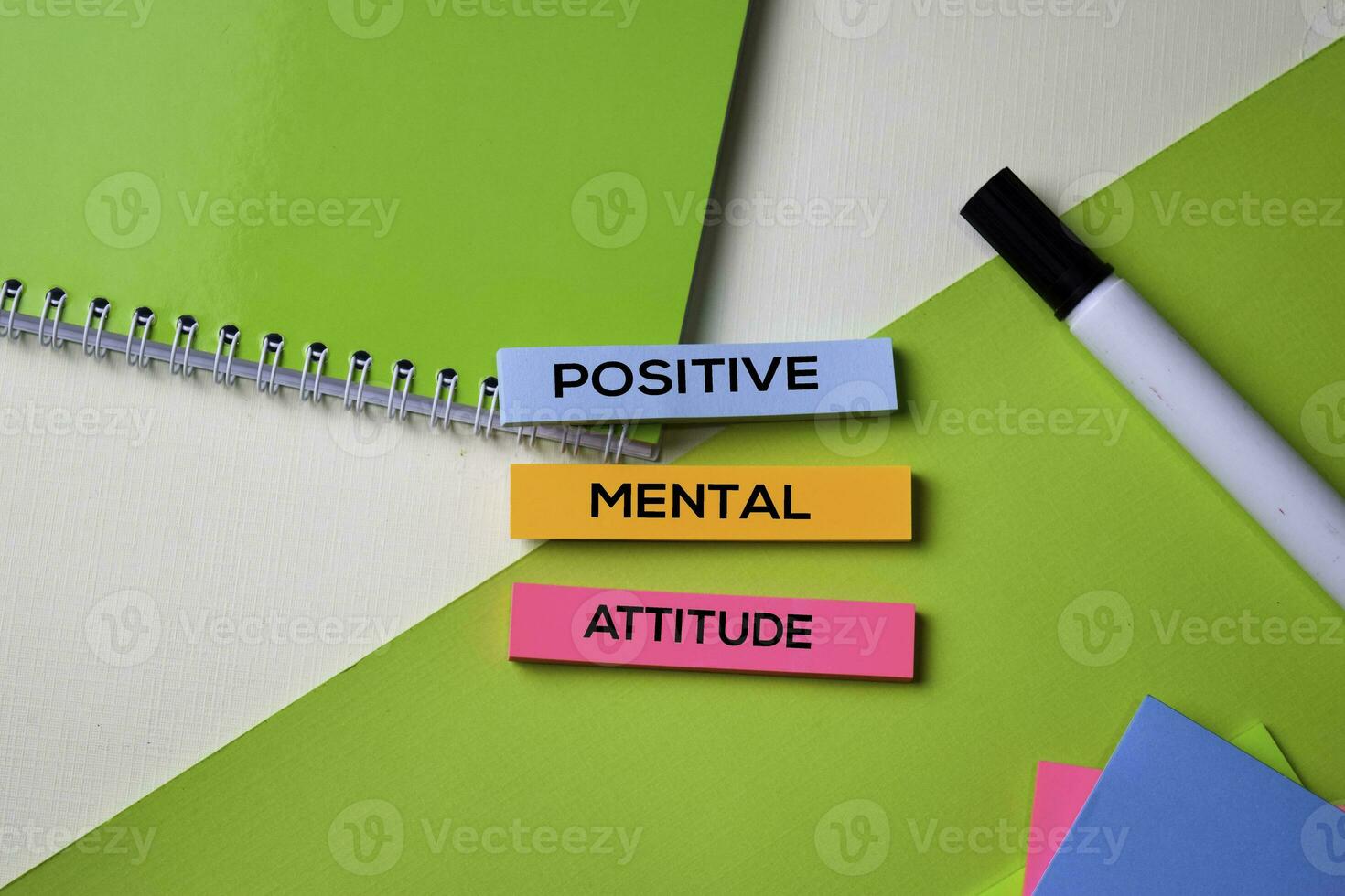 Positive Mental Attitude text on top view office desk table of Business workplace and business objects. photo