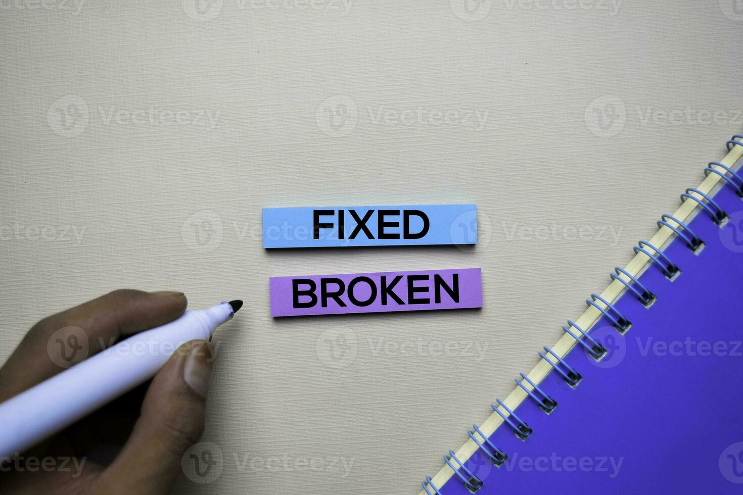 Fixed or Broken text on sticky notes with office desk concept photo