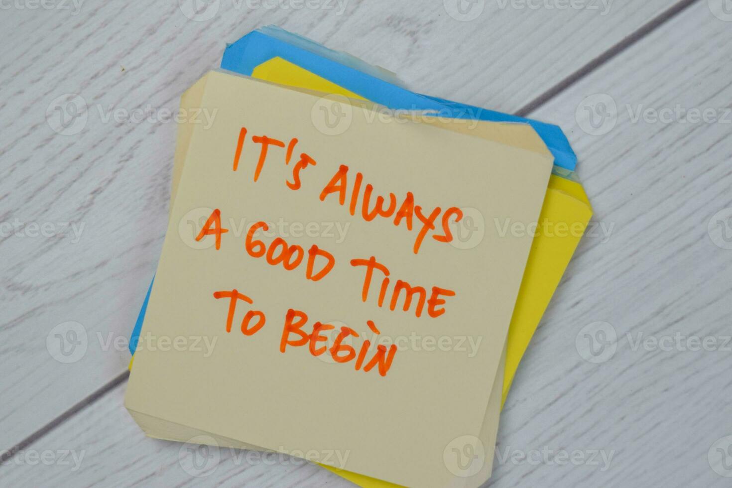 It's Always A Good Time To Begin write on sticky notes isolated on Wooden Table. photo