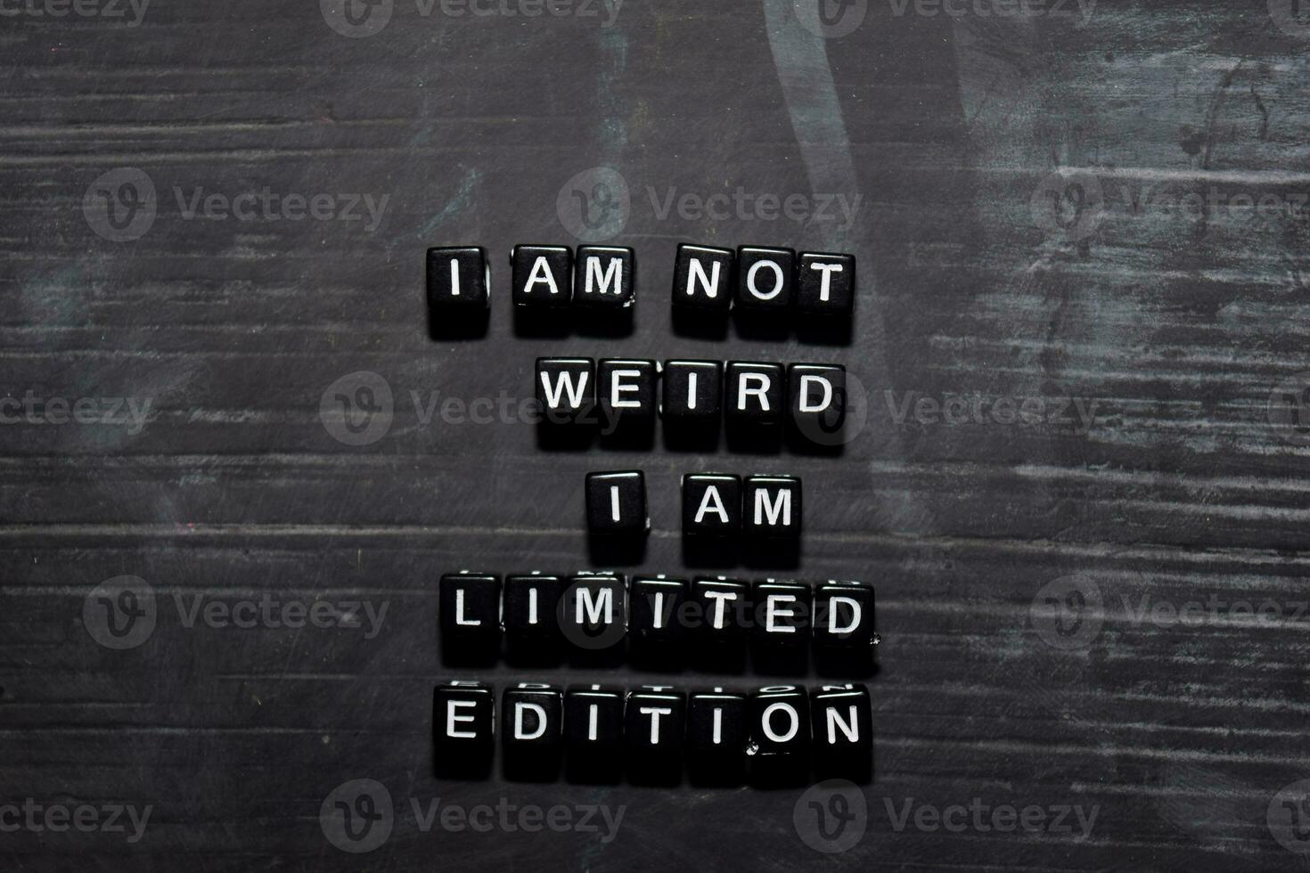 I'm not weird, I am limited edition on wooden blocks. Education, Motivation and inspiration concept photo