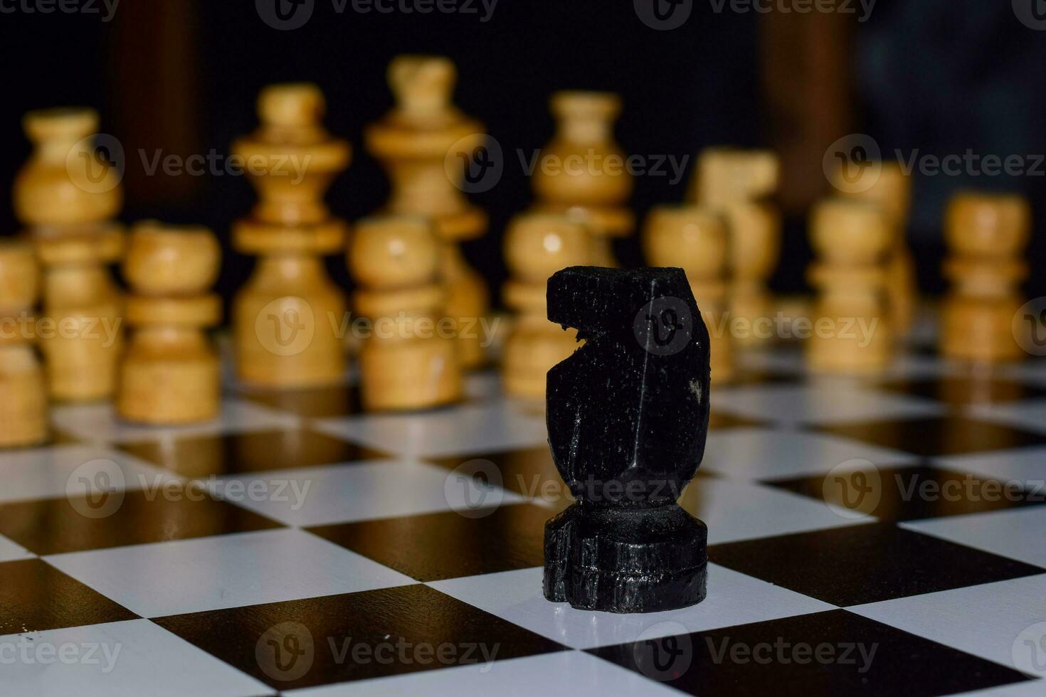 Chess game for ideas and competition and strategy. Photographed on a chessboard photo