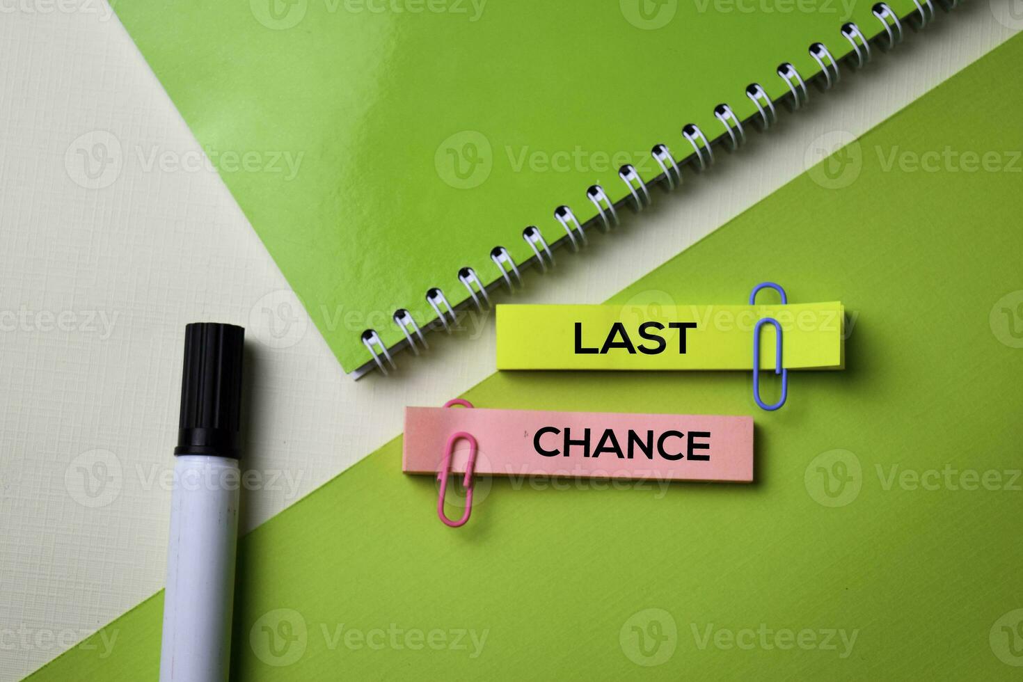 Last Chance text on top view office desk table of Business workplace and business objects. photo