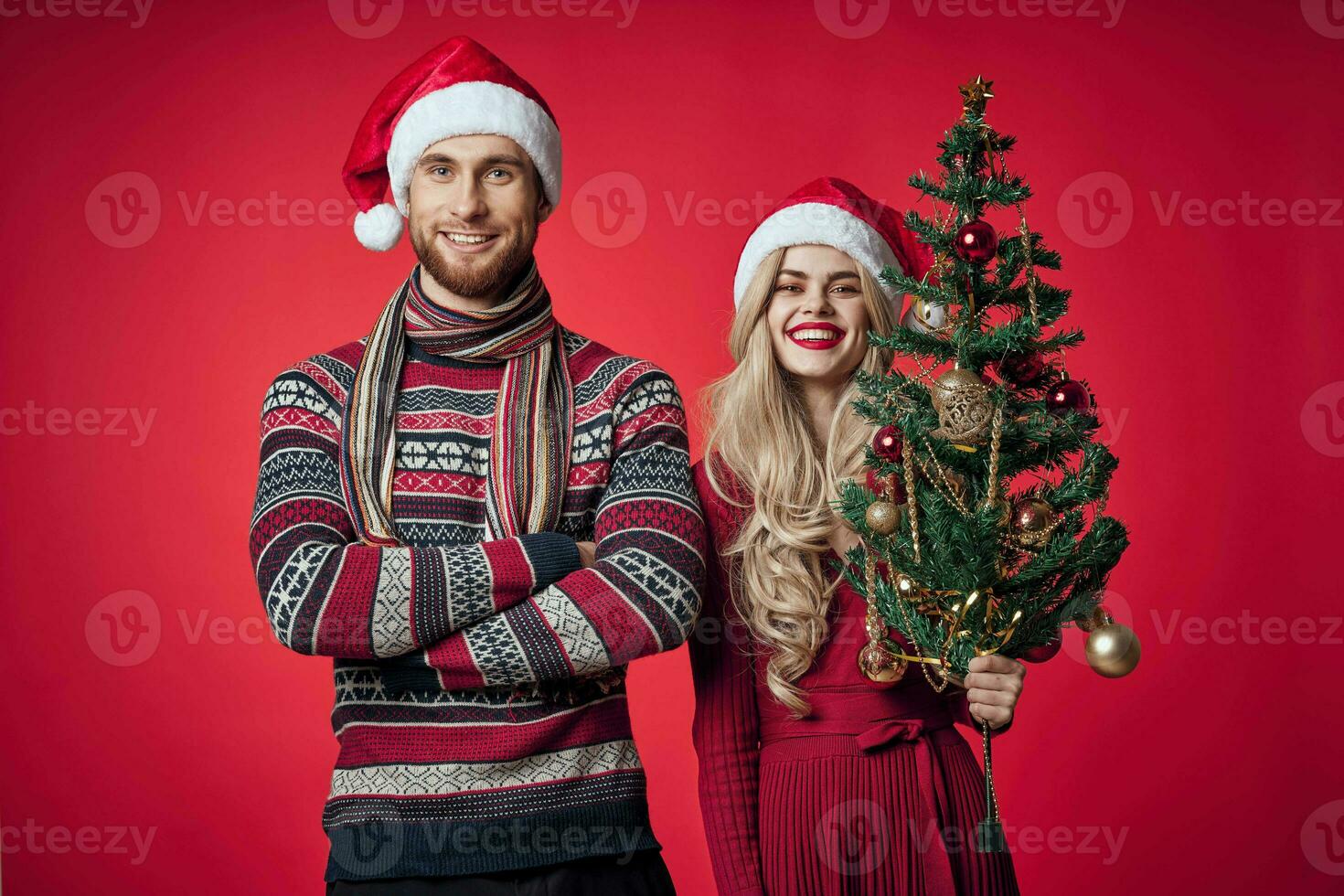 cute married couple in new year clothes holiday christmas studio photo