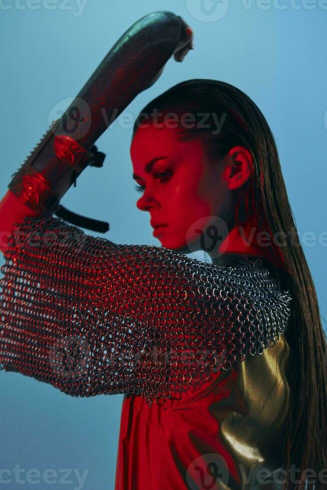 young woman red light silver armor chain mail fashion Lifestyle unaltered photo