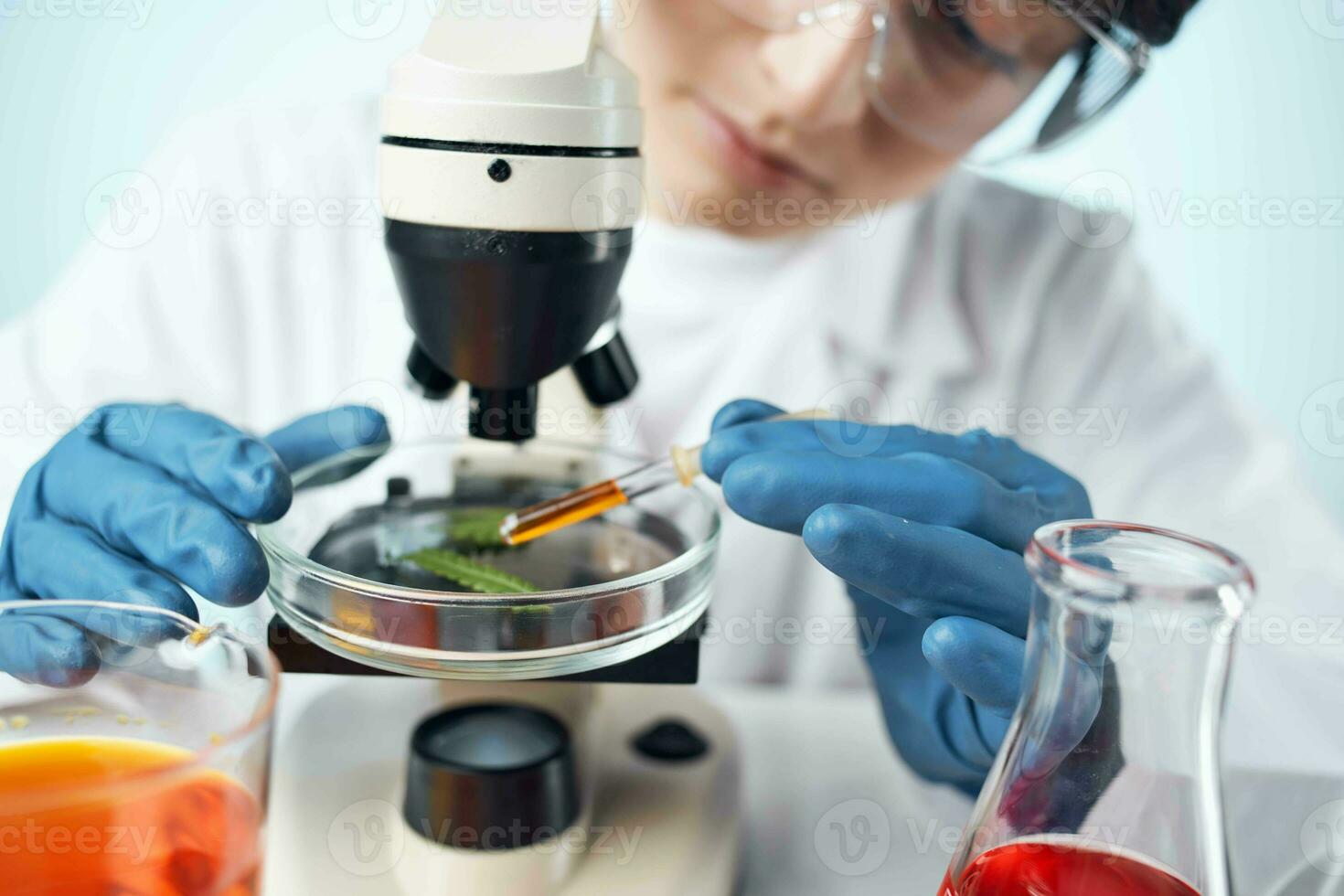 woman laboratory assistant microscope research diagnostics science work photo