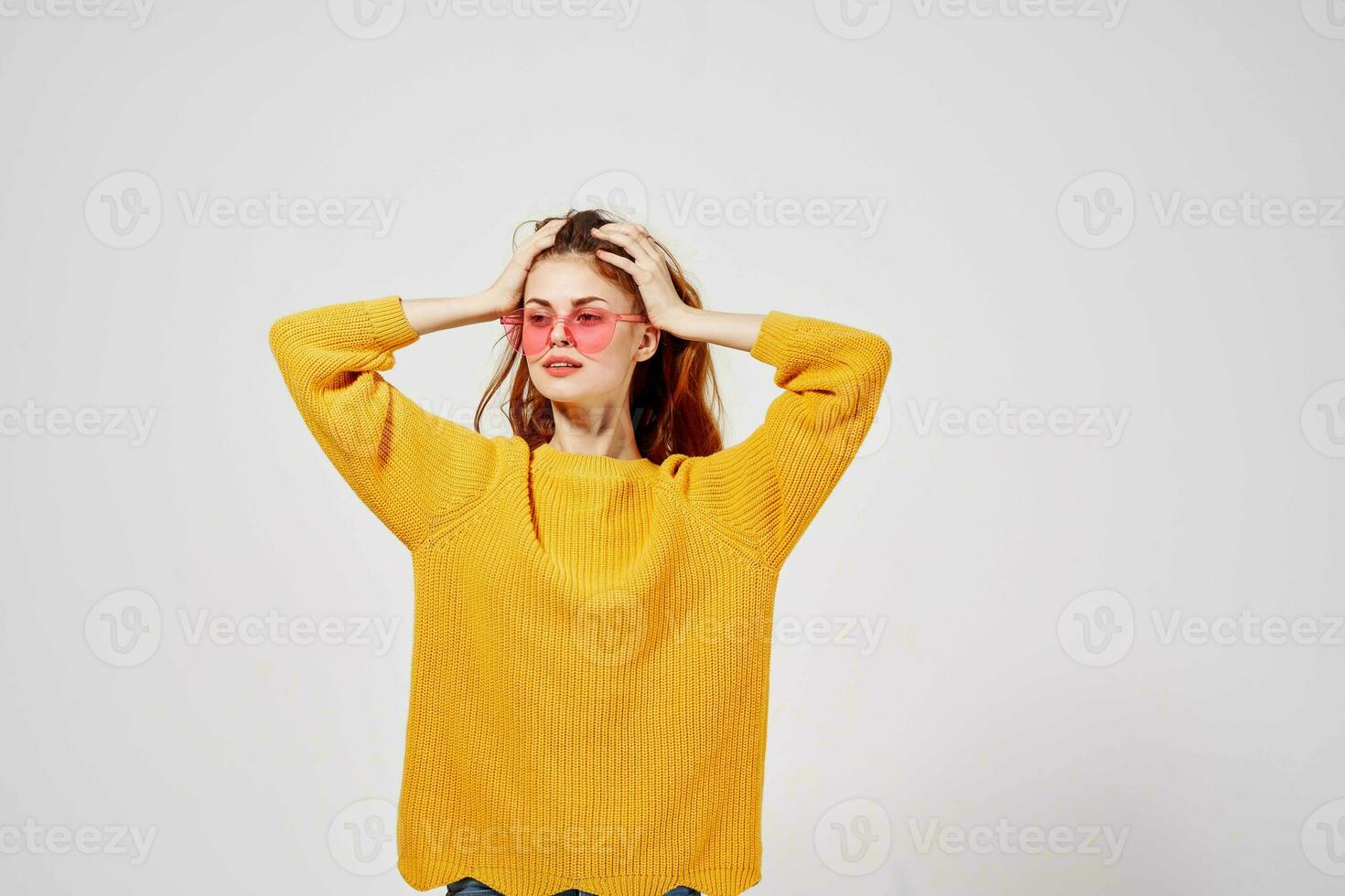 portrait of a woman in a sweater and glasses hairstyle fashion glasses photo