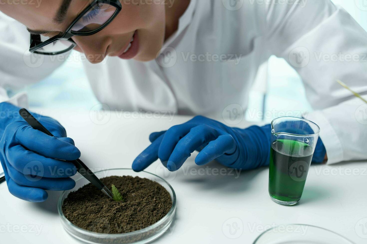 female laboratory assistant biology research plants biology photo