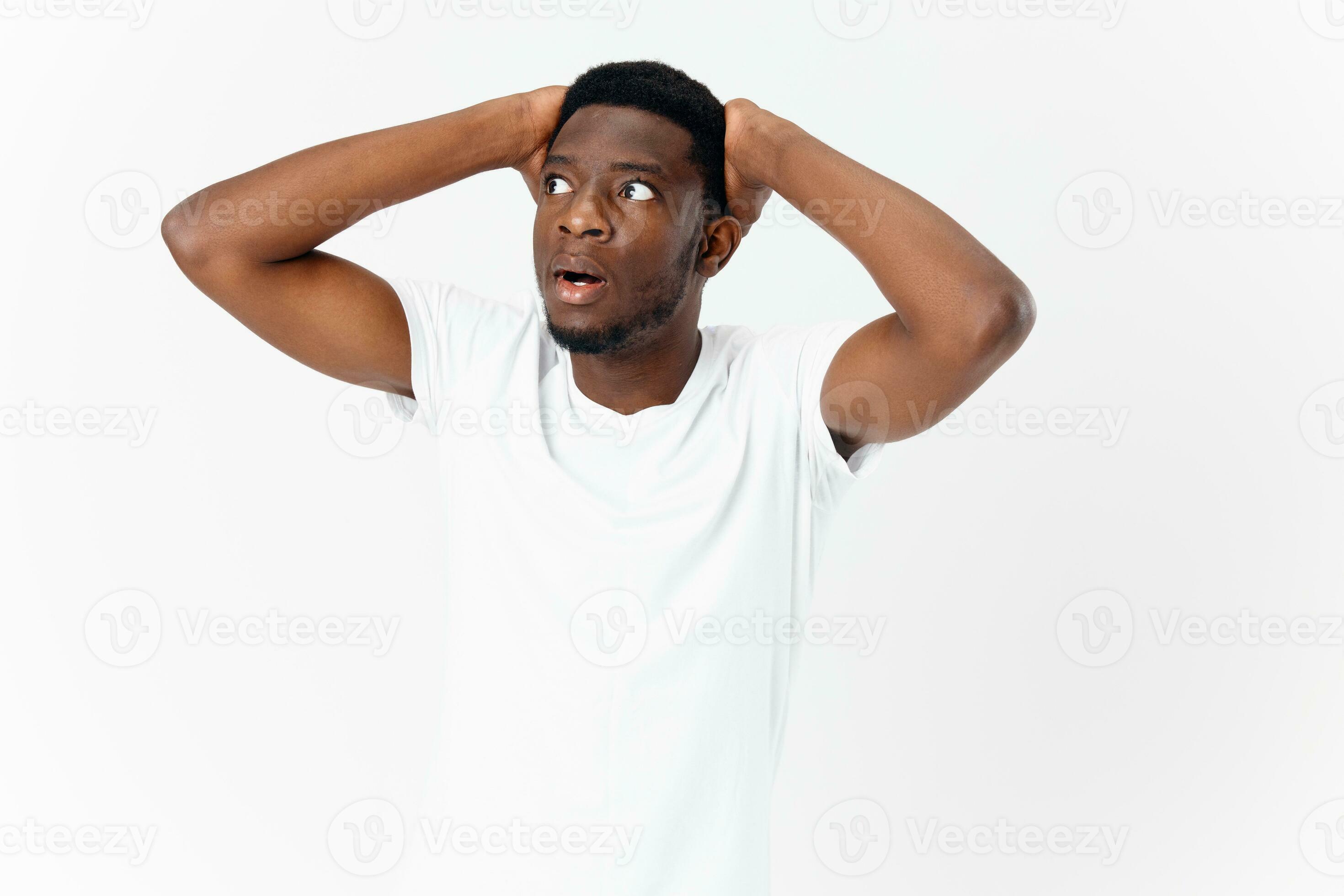 Portrait of young surprised emotional big eyes man with open mouth