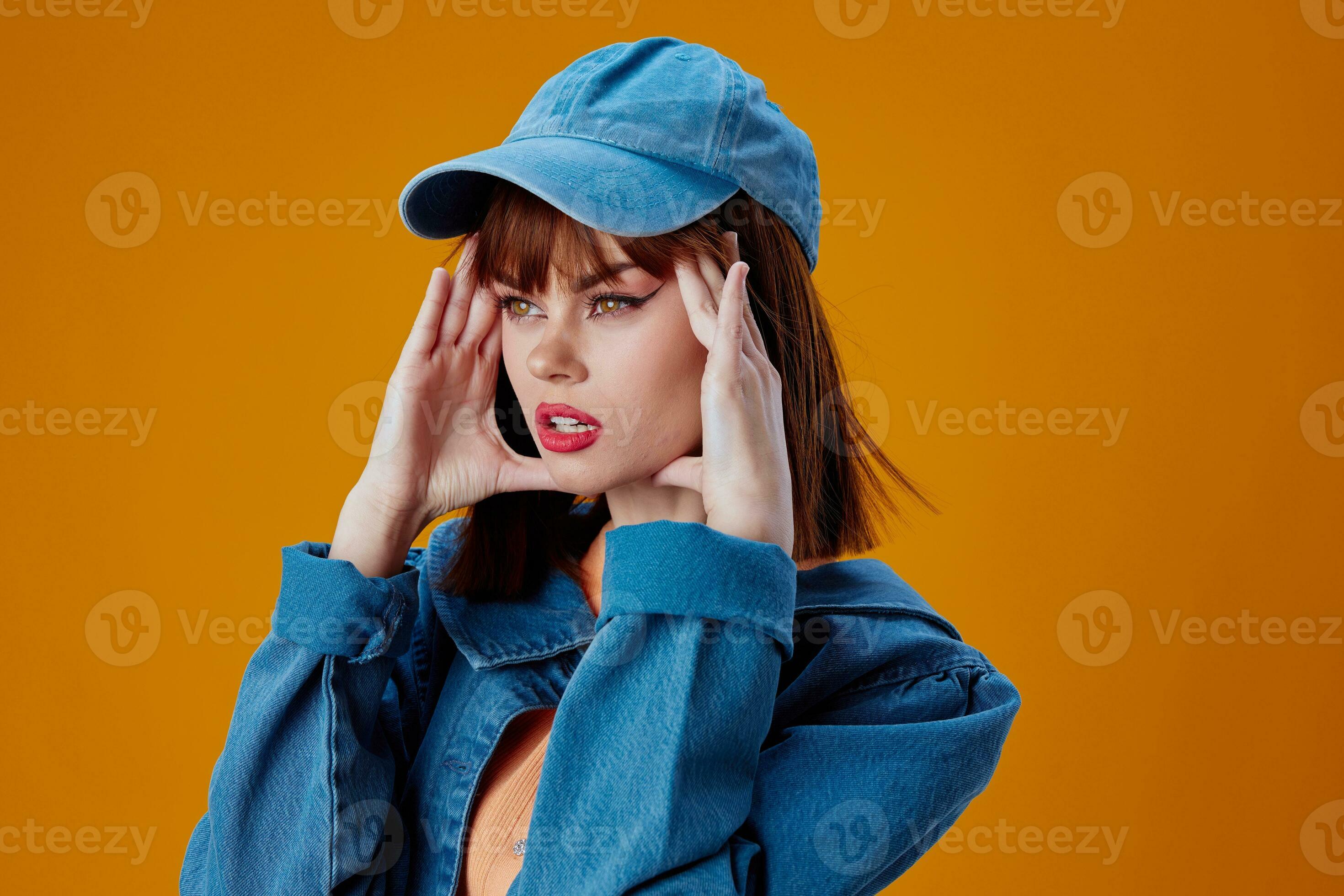 Beautiful fashionable girl stylish denim clothing posing yellow background  unaltered 23661629 Stock Photo at Vecteezy