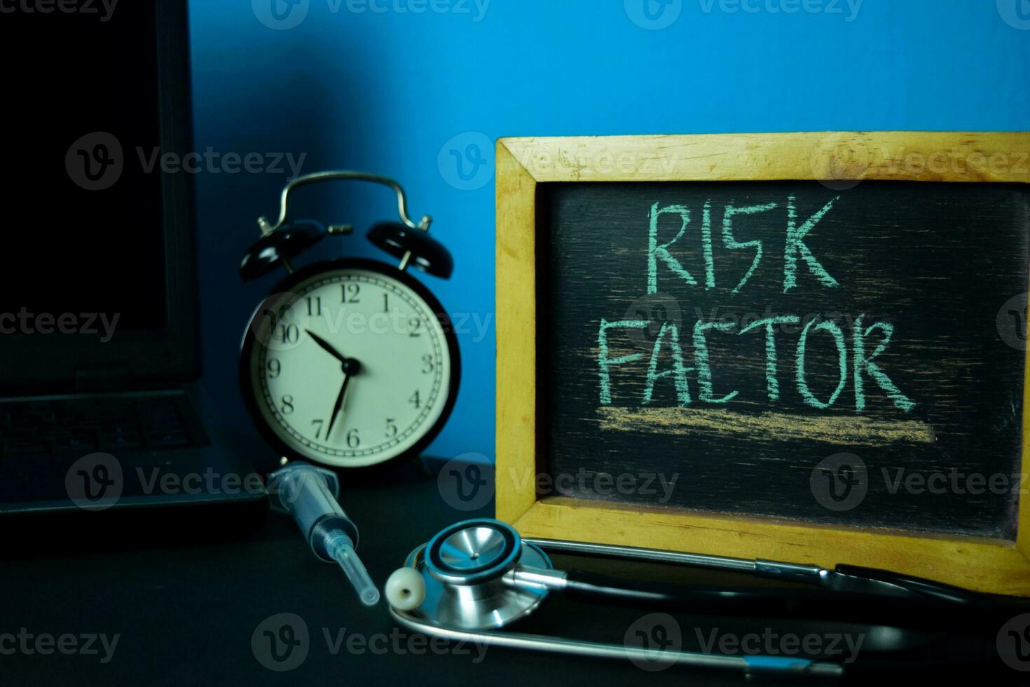 Risk Factor Planning on Background of Working Table with Office Supplies. Medical and Healthcare Concept Planning on Blue Background photo