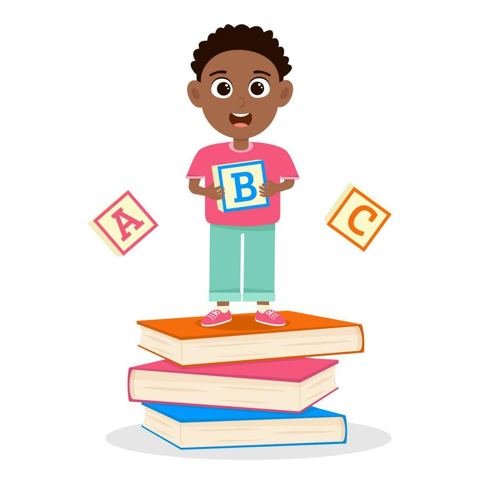 Cute little boy standing on books and holding abc cube. vector