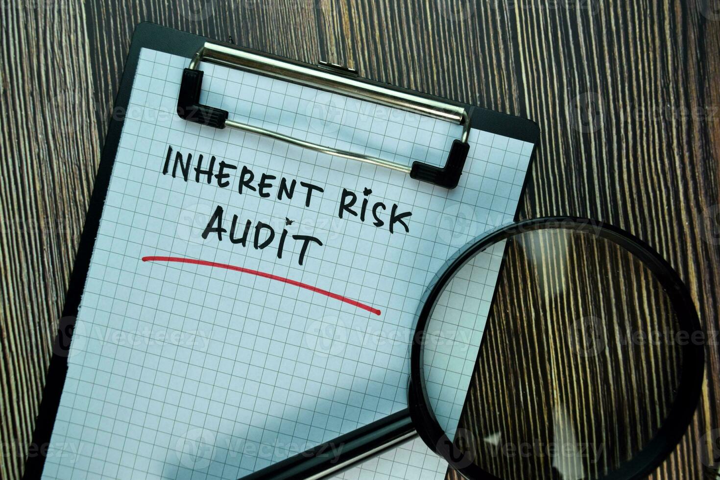 Inherent Risk Audit write on a paperwork isolated on Wooden Table. Business or Financial Concept photo