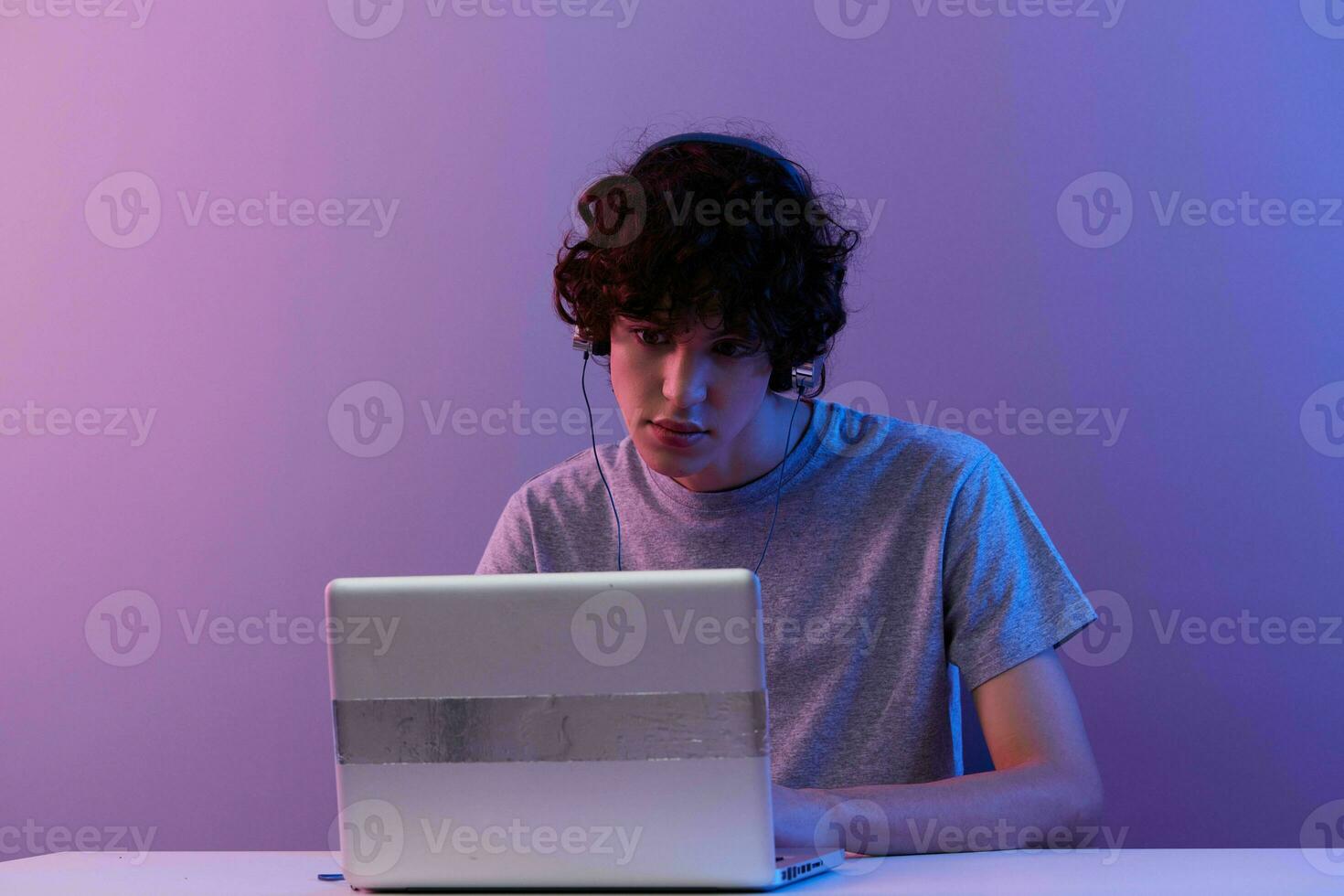 man sitting at the table gaming laptop Lifestyle technology photo