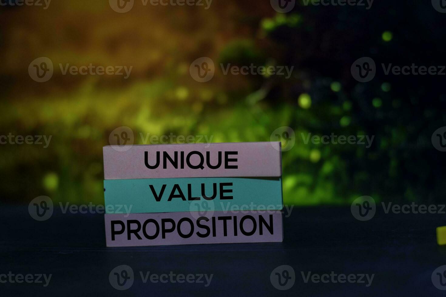 Unique Value Proposition - UVP text on sticky notes isolated on office desk photo