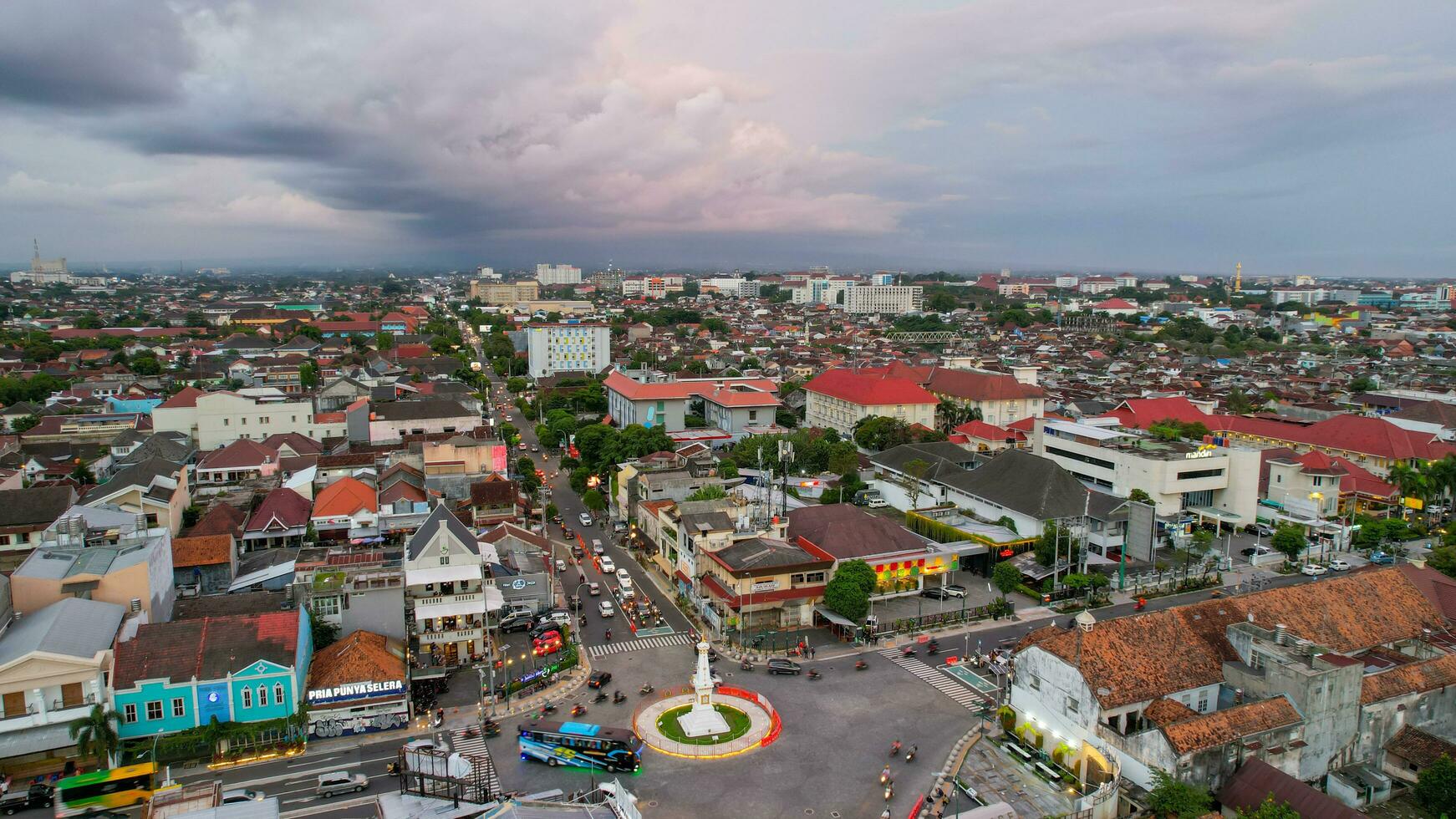 Aerial view of the tugu jogja or known as tugu pal is the iconic landmark of Yogyakarta. Central Java, Indonesia, December 6, 2021 photo