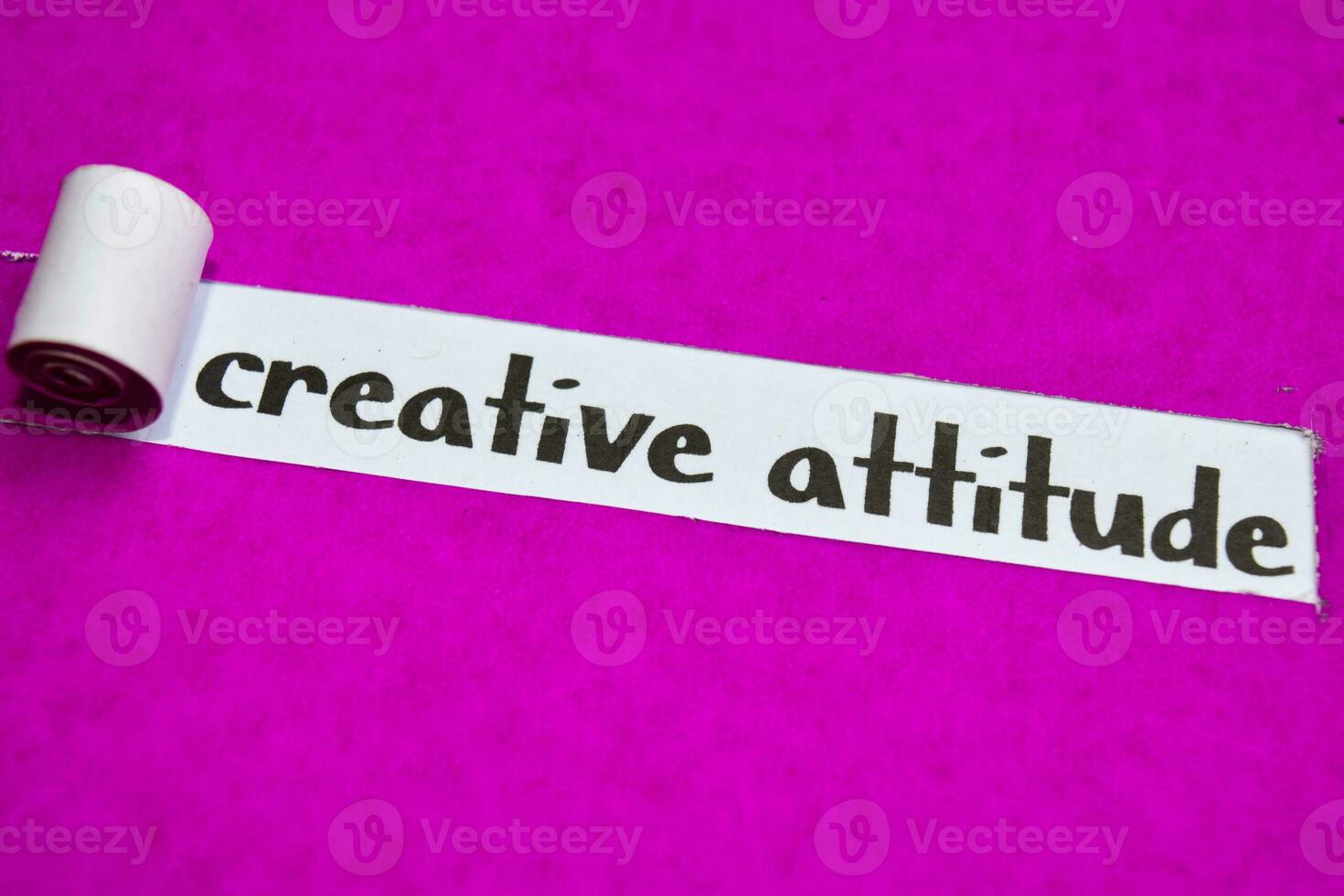 Creative Attitude text, Inspiration, Motivation and business concept on purple torn paper photo
