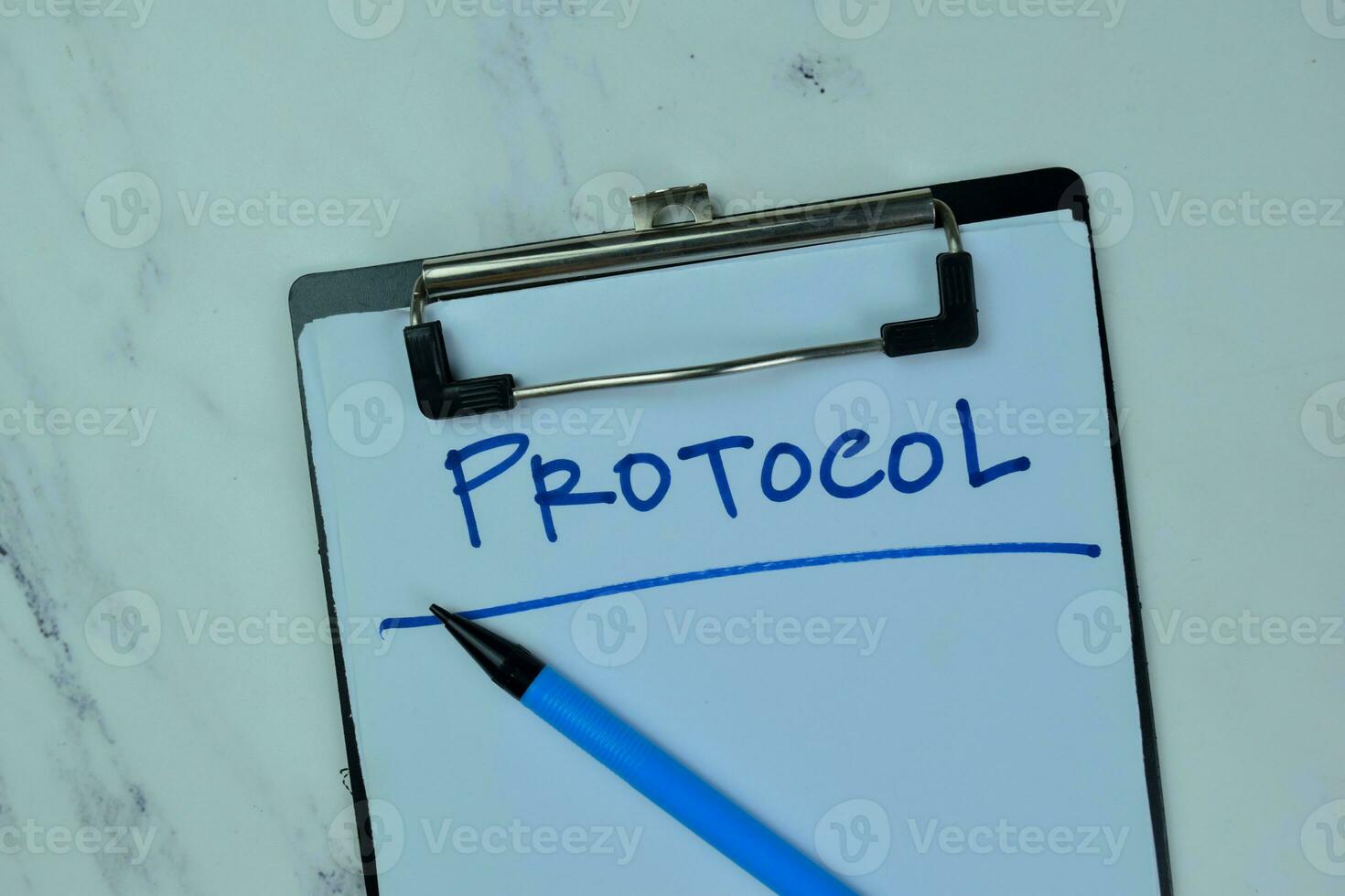 Concept of Protocol write on a paperwork isolated on Wooden Table. photo