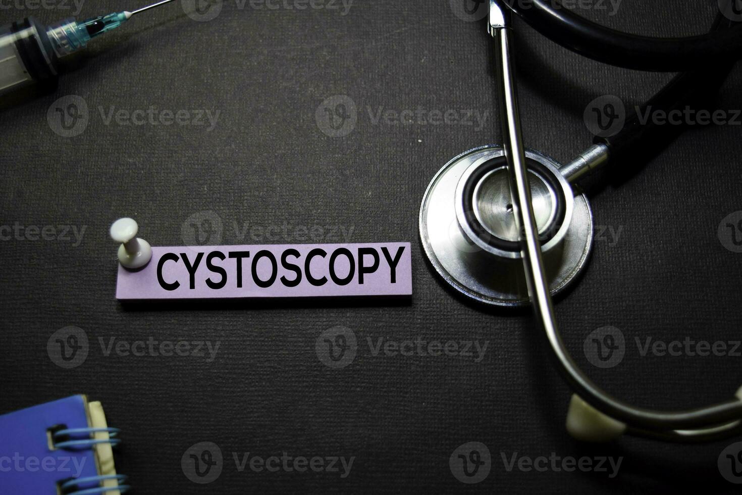 Cystoscopy text on Sticky Notes. Top view isolated on black background. Healthcare Medical concept photo