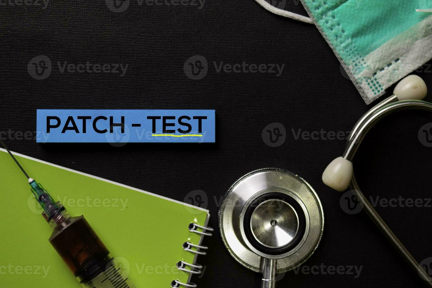 Patch - Test on top view black table with blood sample and Healthcare medical concept. photo