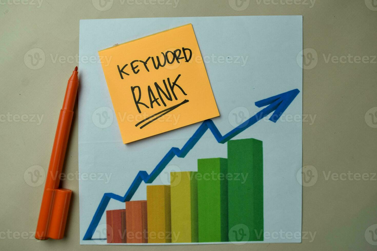 Keyword Rank write on sticky notes isolated on office desk. photo