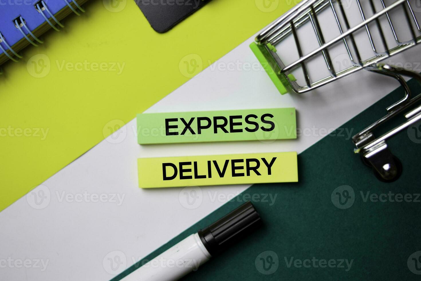 Express Delivery text on sticky notes with office desk concept photo