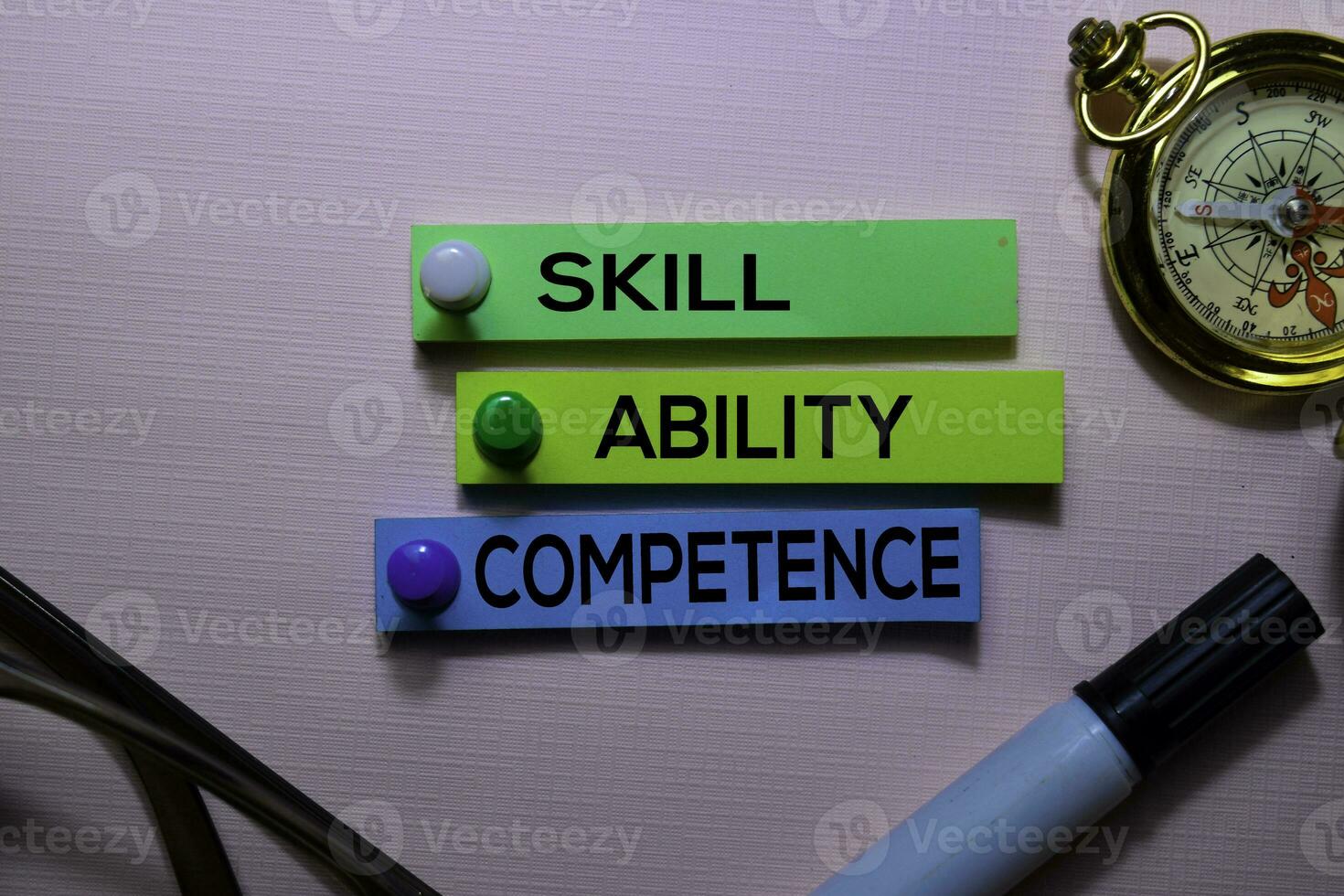 Skill, Ability, Competence text on sticky notes isolated on office desk photo