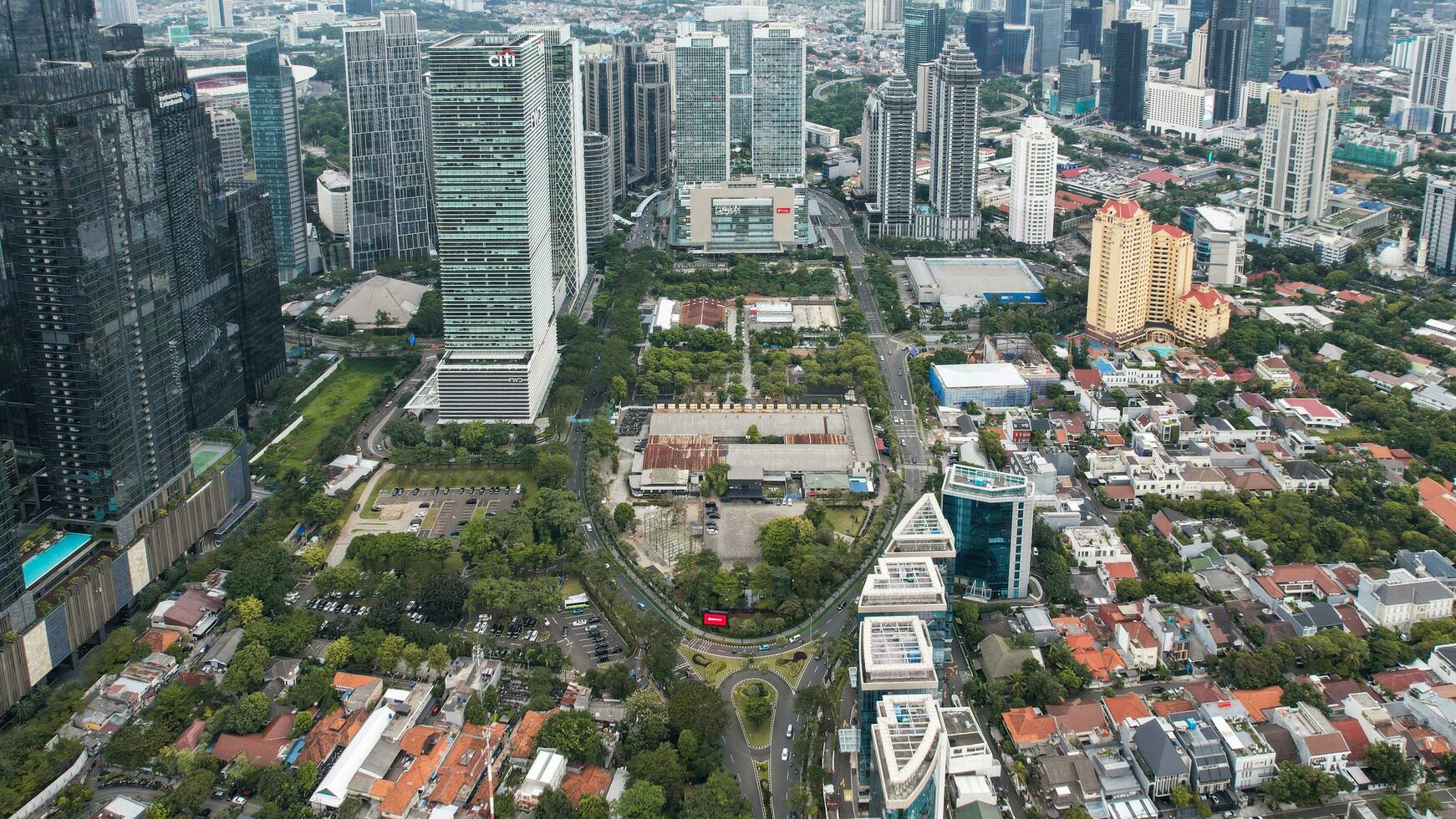 Aerial view of Asia Business concept for real estate - panoramic modern cityscape building bird eye aerial view under sunrise and morning blue bright sky. Jakarta, Indonesia, October 28, 2022 photo