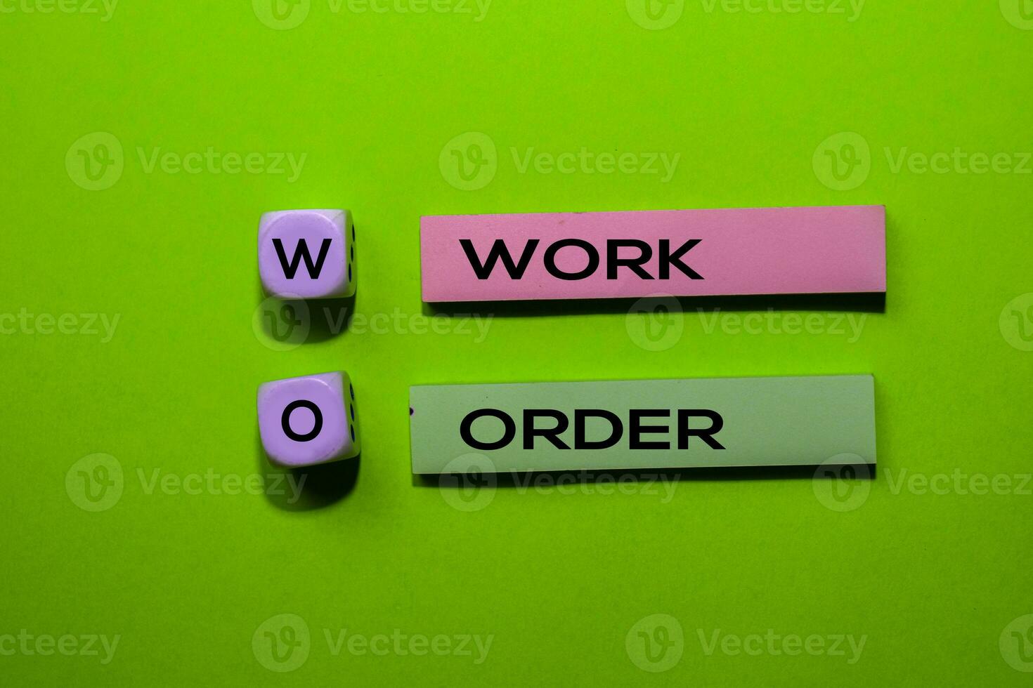 WO - Work Order acronym write on sticky notes isolated on Green ...