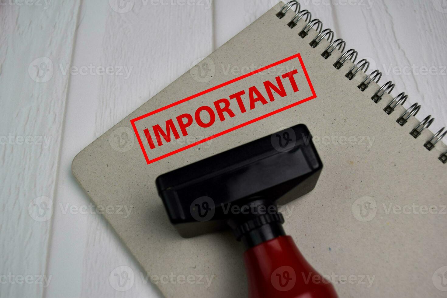 Red Handle Rubber Stamper and Important text isolated on White Background. photo