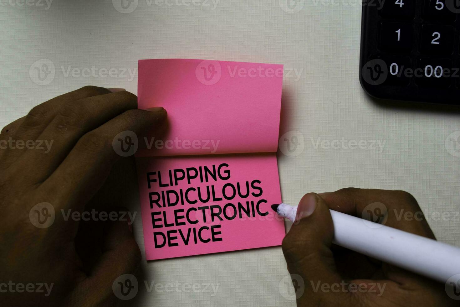 Flipping Ridiculous Electronic Device - FRED text on sticky notes isolated on office desk photo