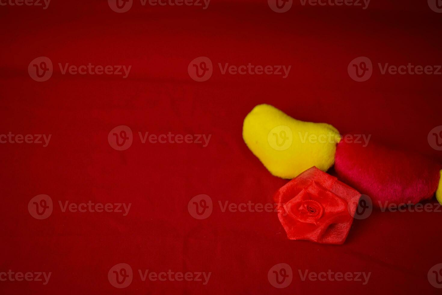 Pillow hearts shape on red background with copy space. Happy Valentine's day photo