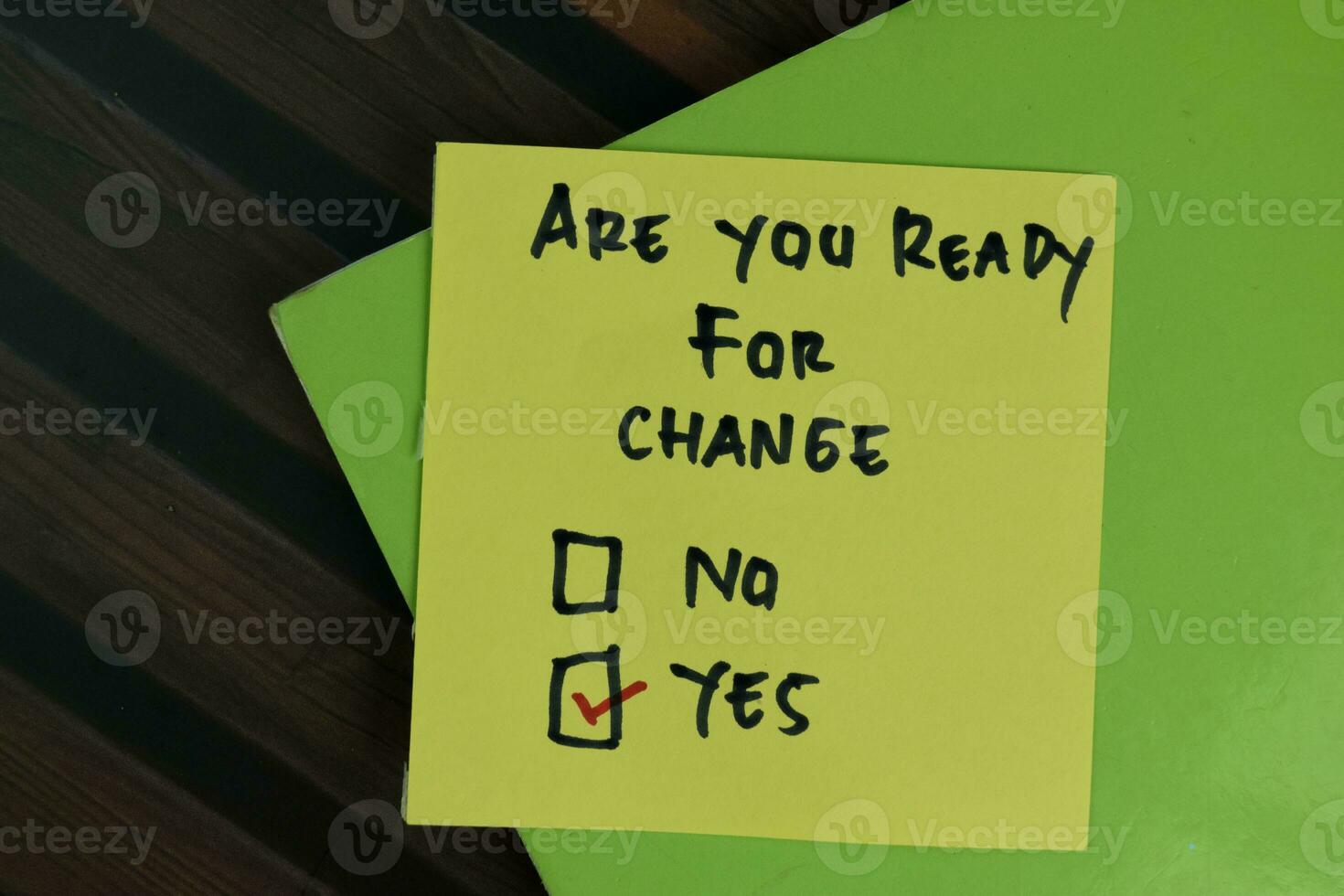 Are You Ready For Change write on sticky notes and supported by additional services write on a sticky notes isolated on Wooden Table. photo