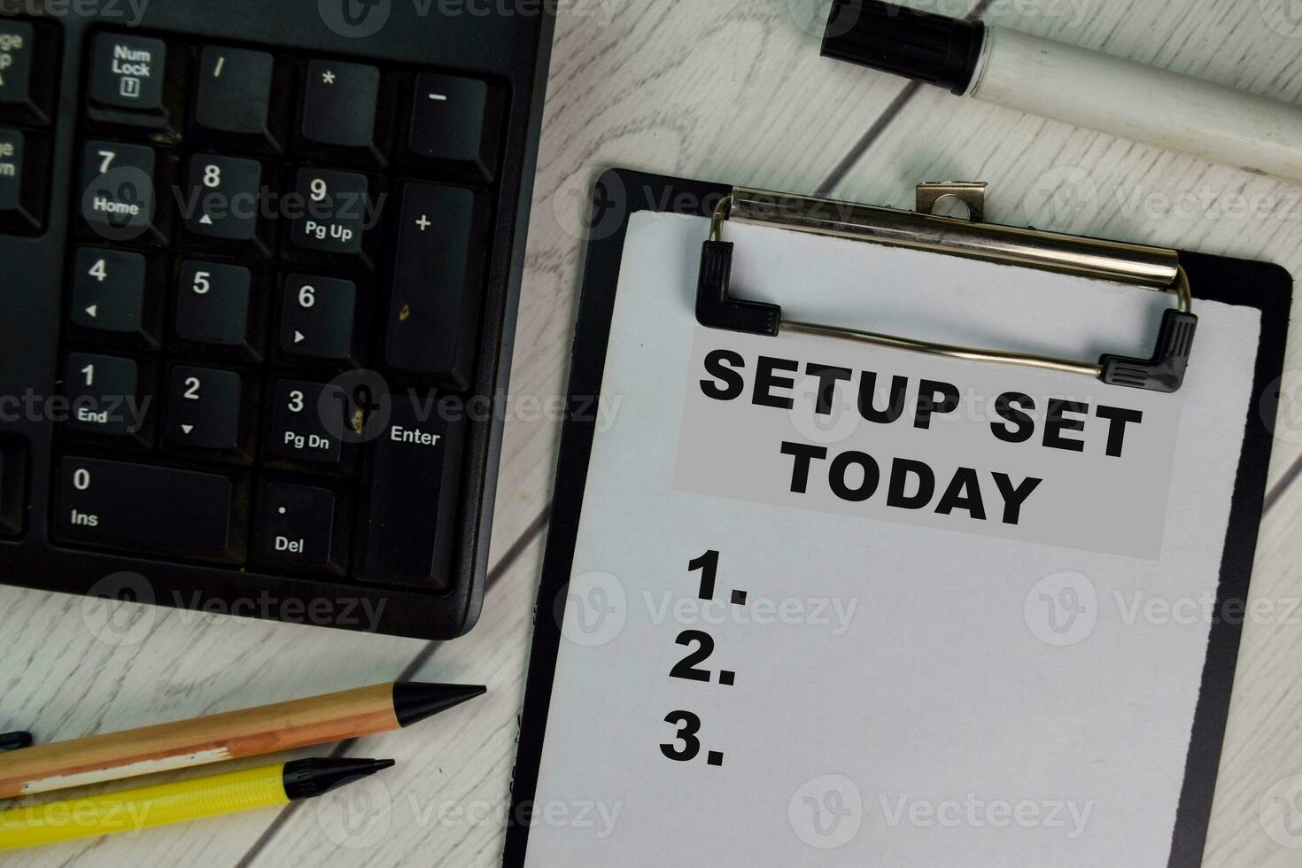 Setup Set Today write on a paperwork and supported by additional services isolated on Wooden Table. photo