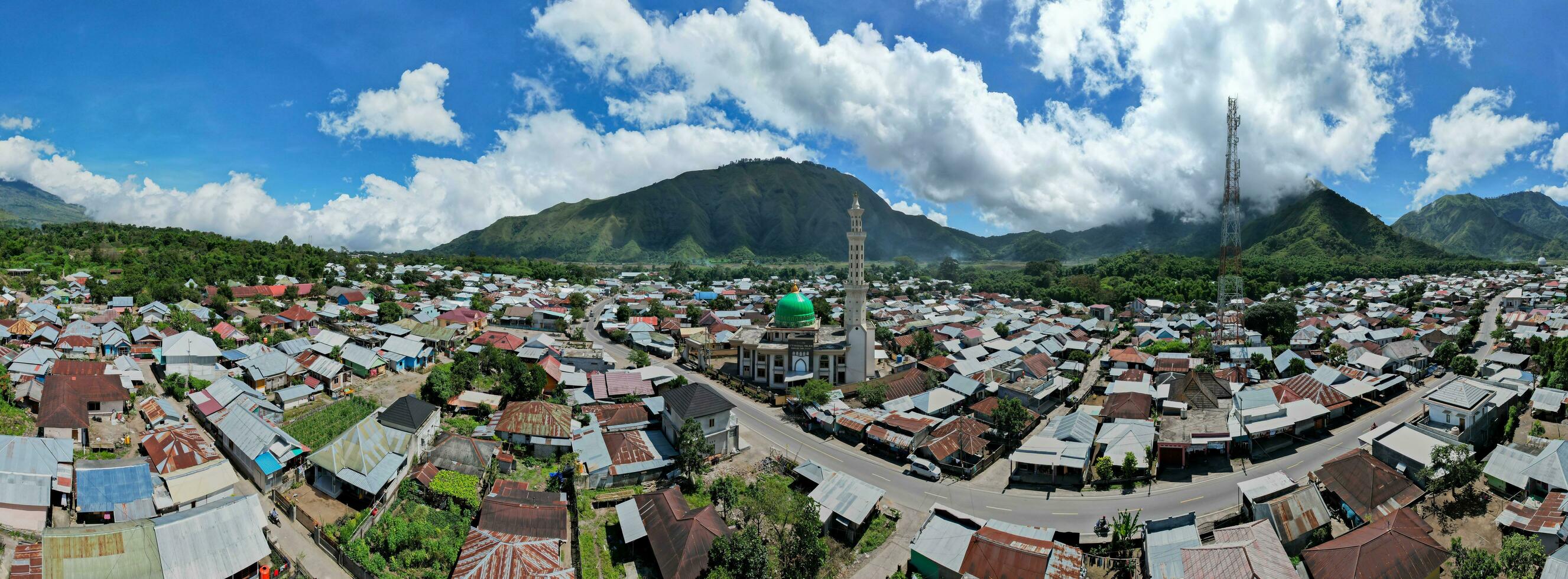 Aerial view of some agricultural fields in Sembalun. Sembalun is situated on the slope of mount Rinjani and is surrounded by beautiful green mountains. Lombok, Indonesia, March 22, 2022 photo