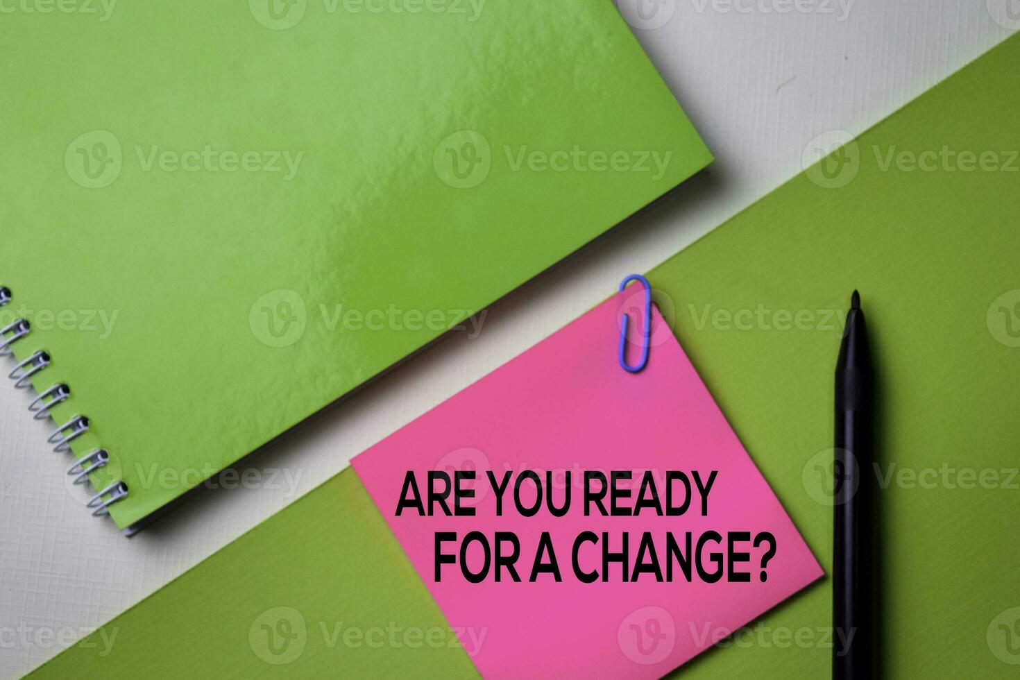 Are You Ready For a Change text on top view office desk table of Business workplace and business objects. photo