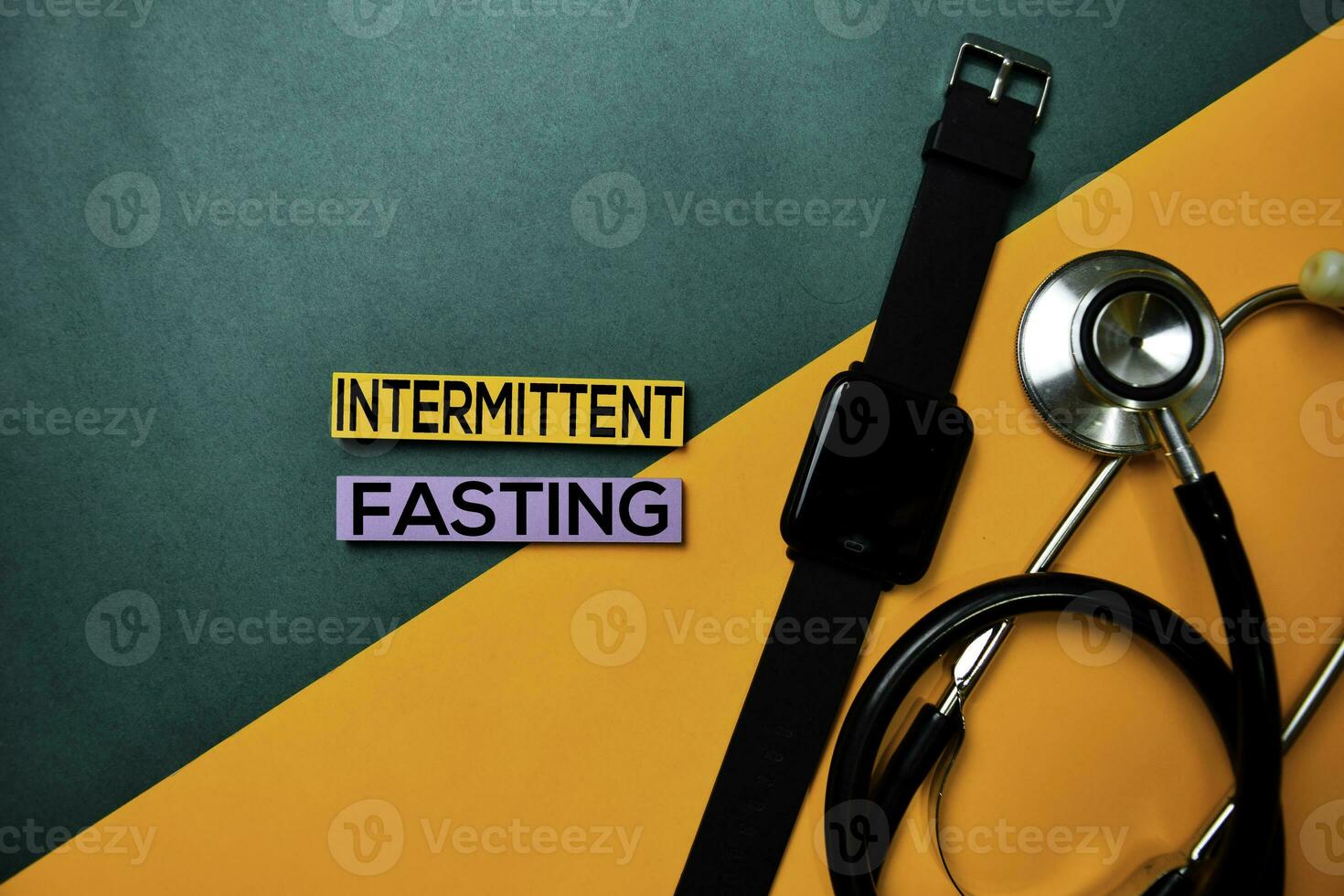 Intermittent Fasting text on top view color table and Healthcare medical concept. photo