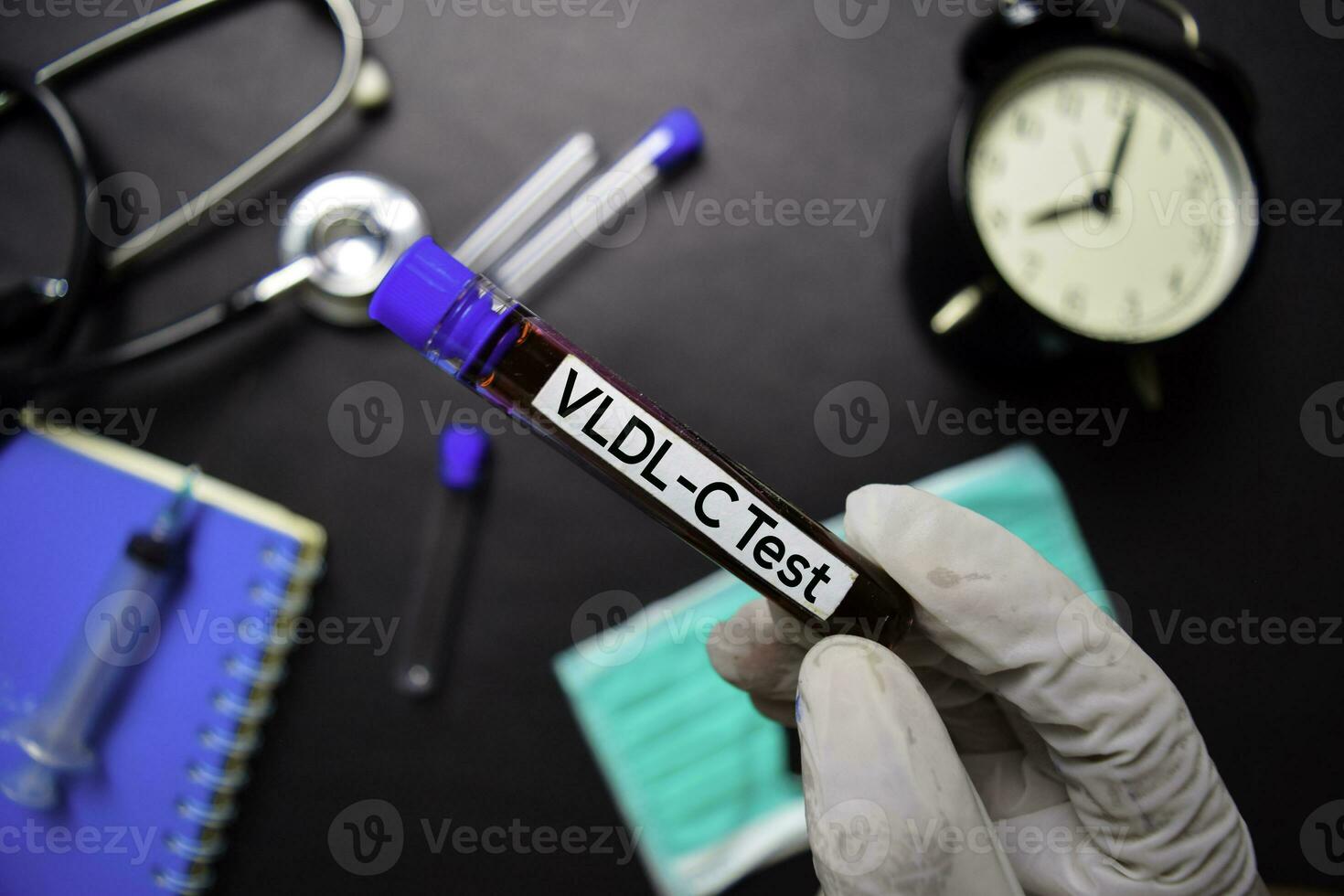VLDLC Test with blood sample. Top view isolated on black background