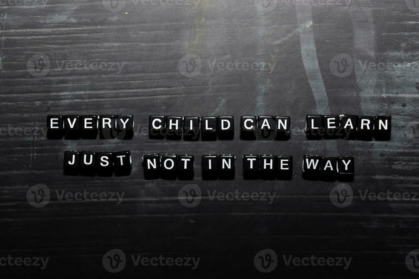 Every child can learn, just not in the way on wooden blocks. Education, Motivation and inspiration concept photo