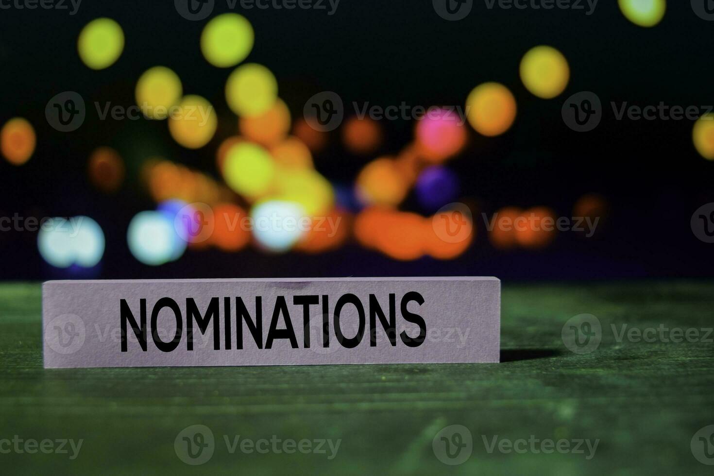 Nominations on the sticky notes with bokeh background photo