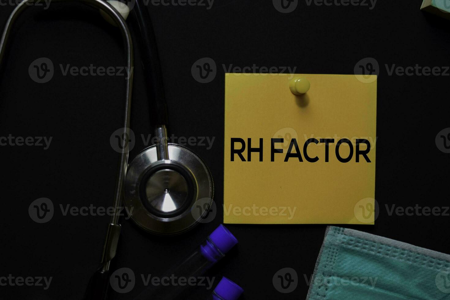 RH Factor text on sticky notes. Office desk background. Medical or Healthcare concept photo