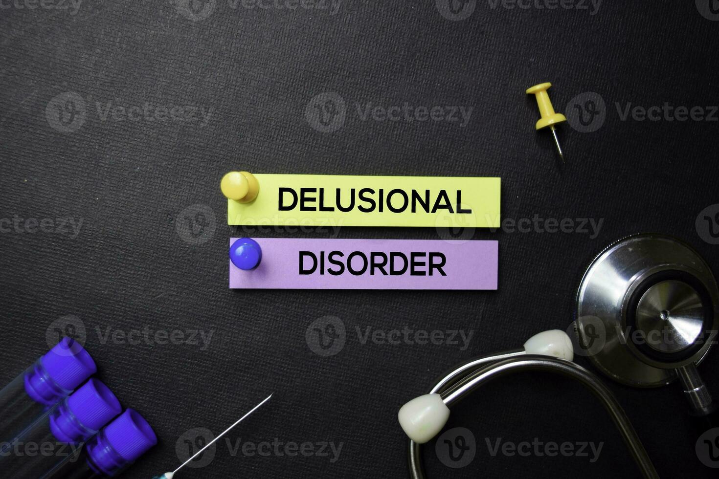 Delusional Disorder text on Sticky Notes. Top view isolated on black background. Healthcare Medical concept photo