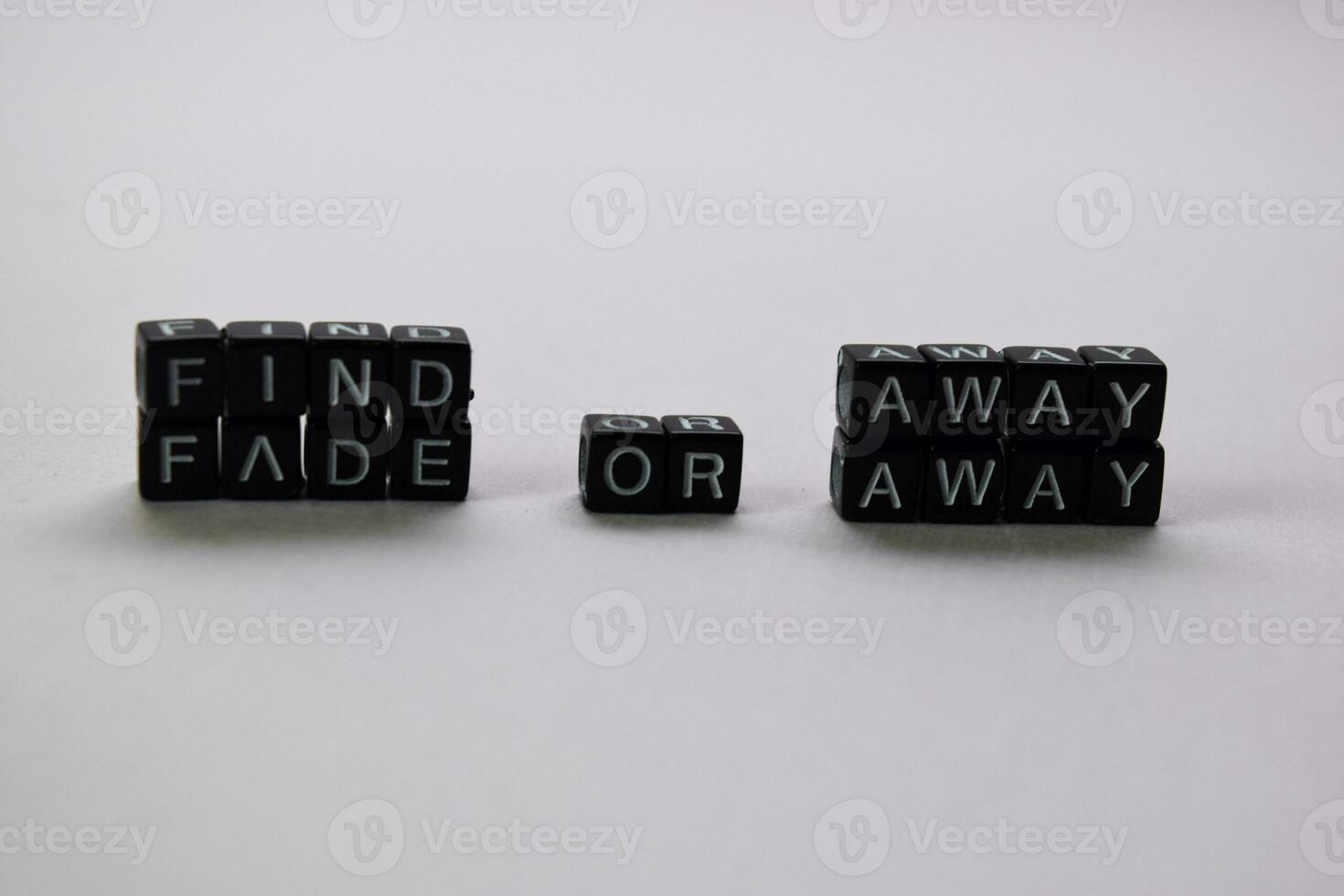 Find away or fade away on wooden blocks. Motivation and inspiration concept photo