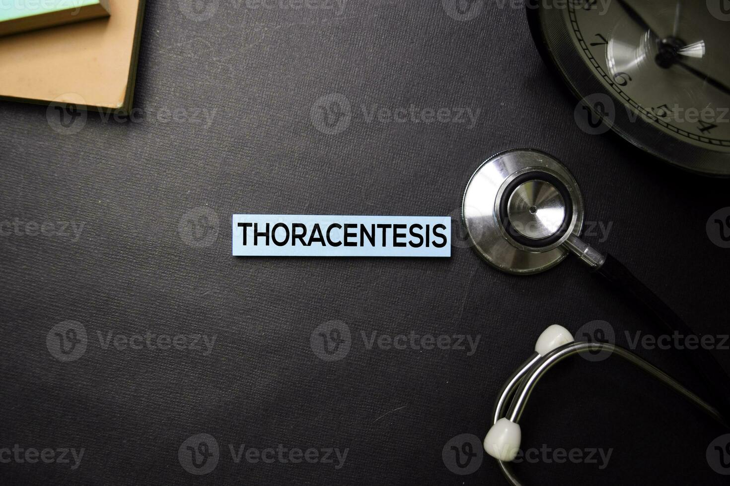 Thoracentesis text on Sticky Notes. Top view isolated on black background. Healthcare Medical concept photo